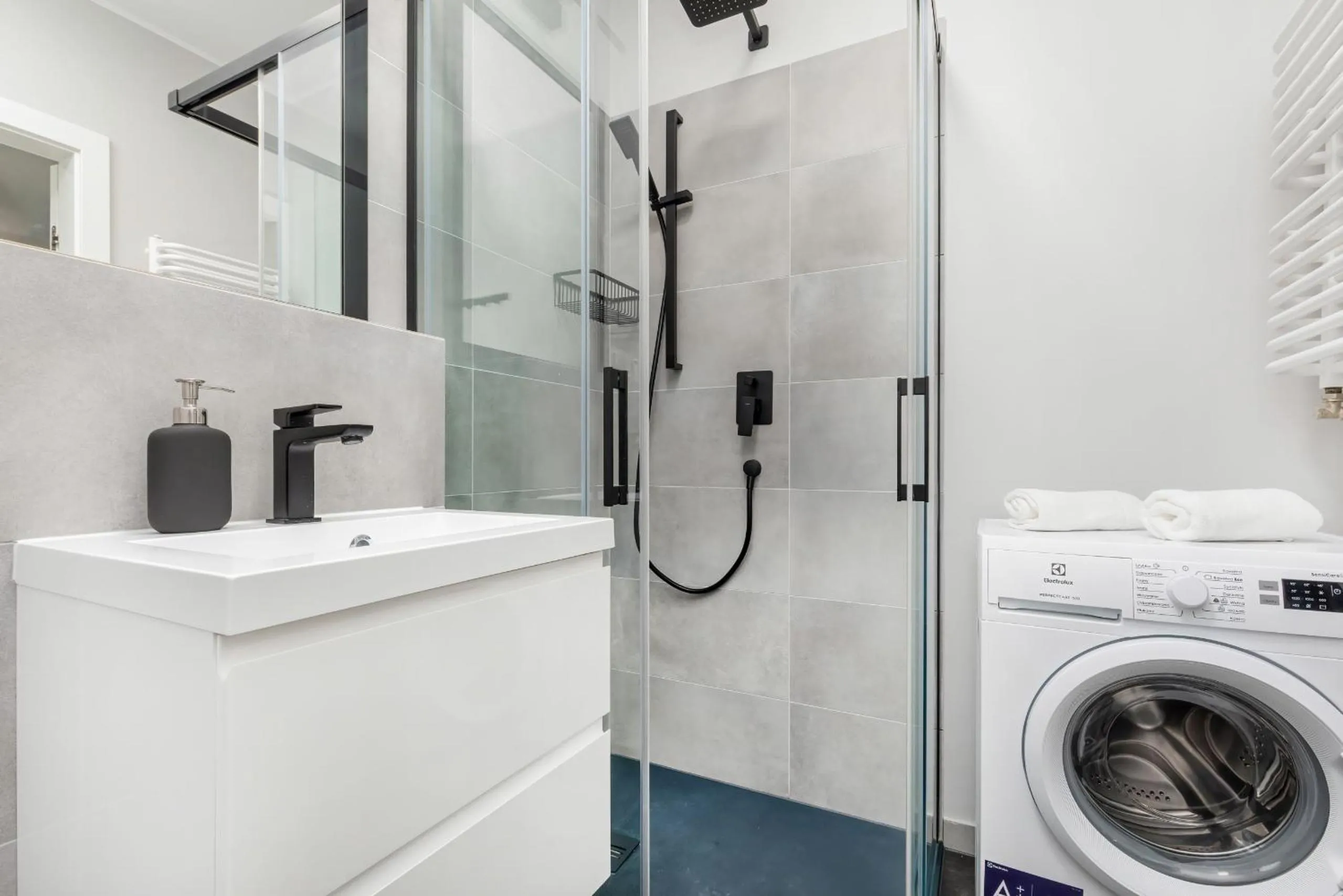 Bathroom in Modern City Center Apartments by Noclegi Renters