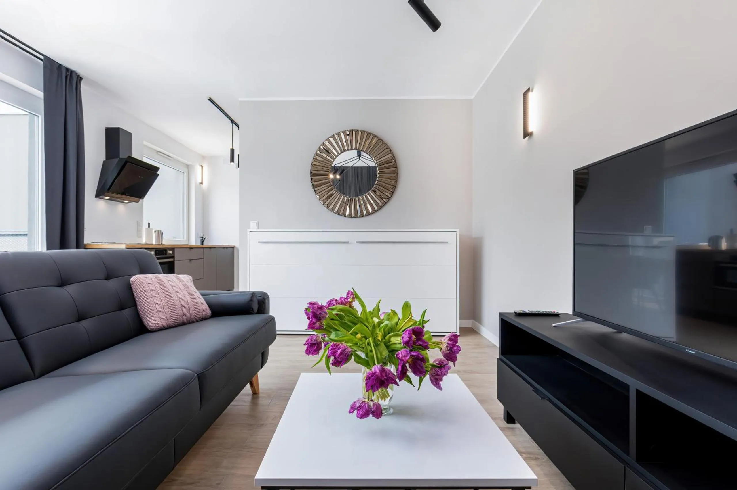 Living room in Modern City Center Apartments by Noclegi Renters