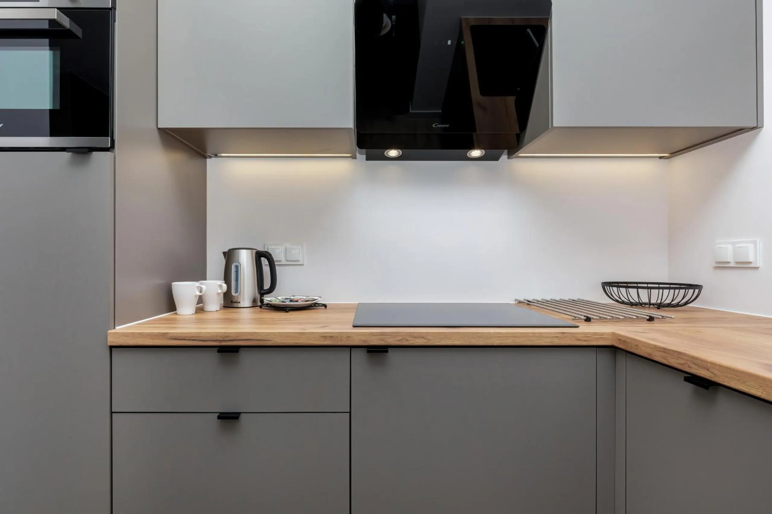 Kitchen or kitchenette in Modern City Center Apartments by Noclegi Renters