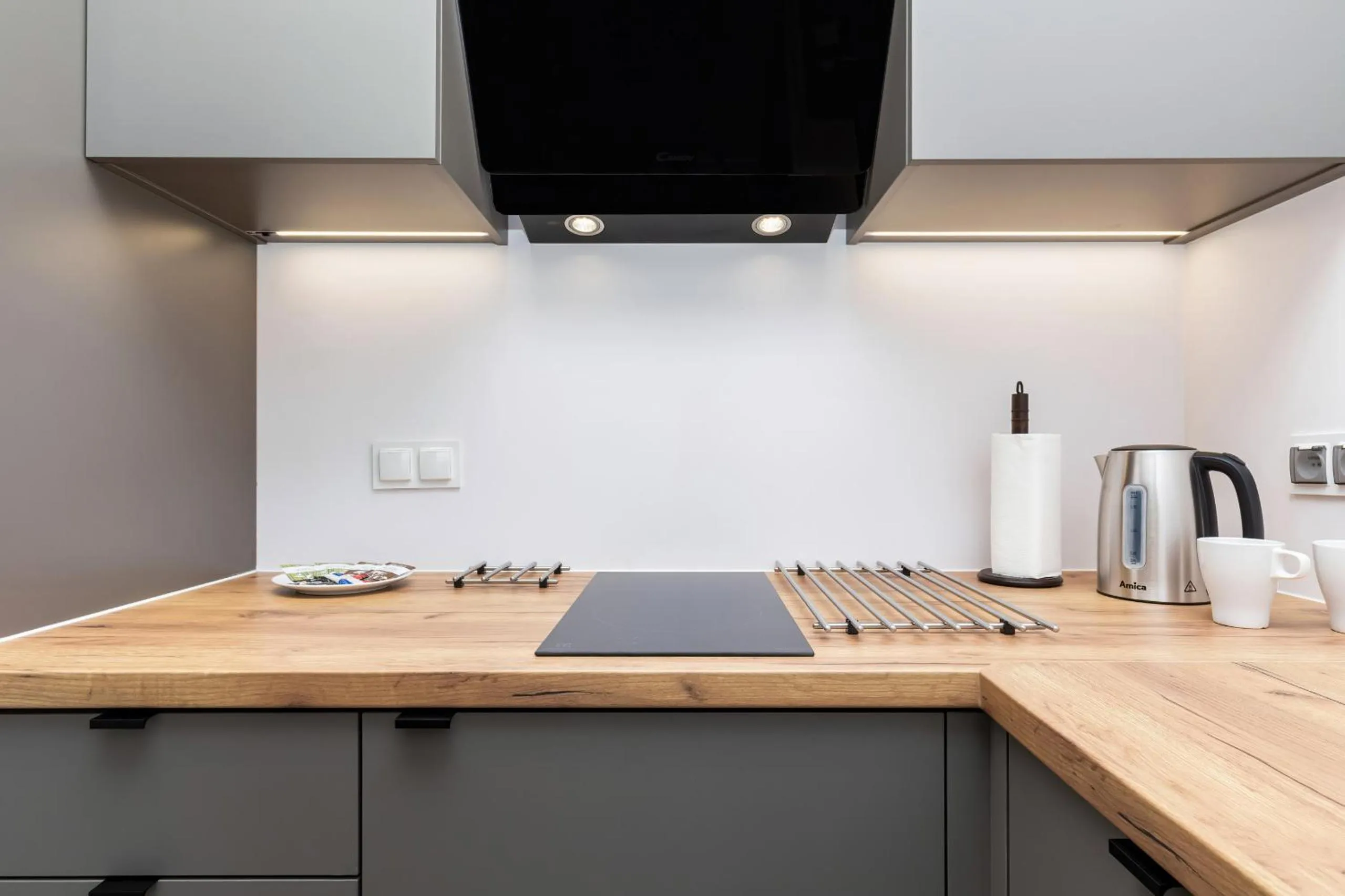 Kitchen or kitchenette in Modern City Center Apartments by Noclegi Renters