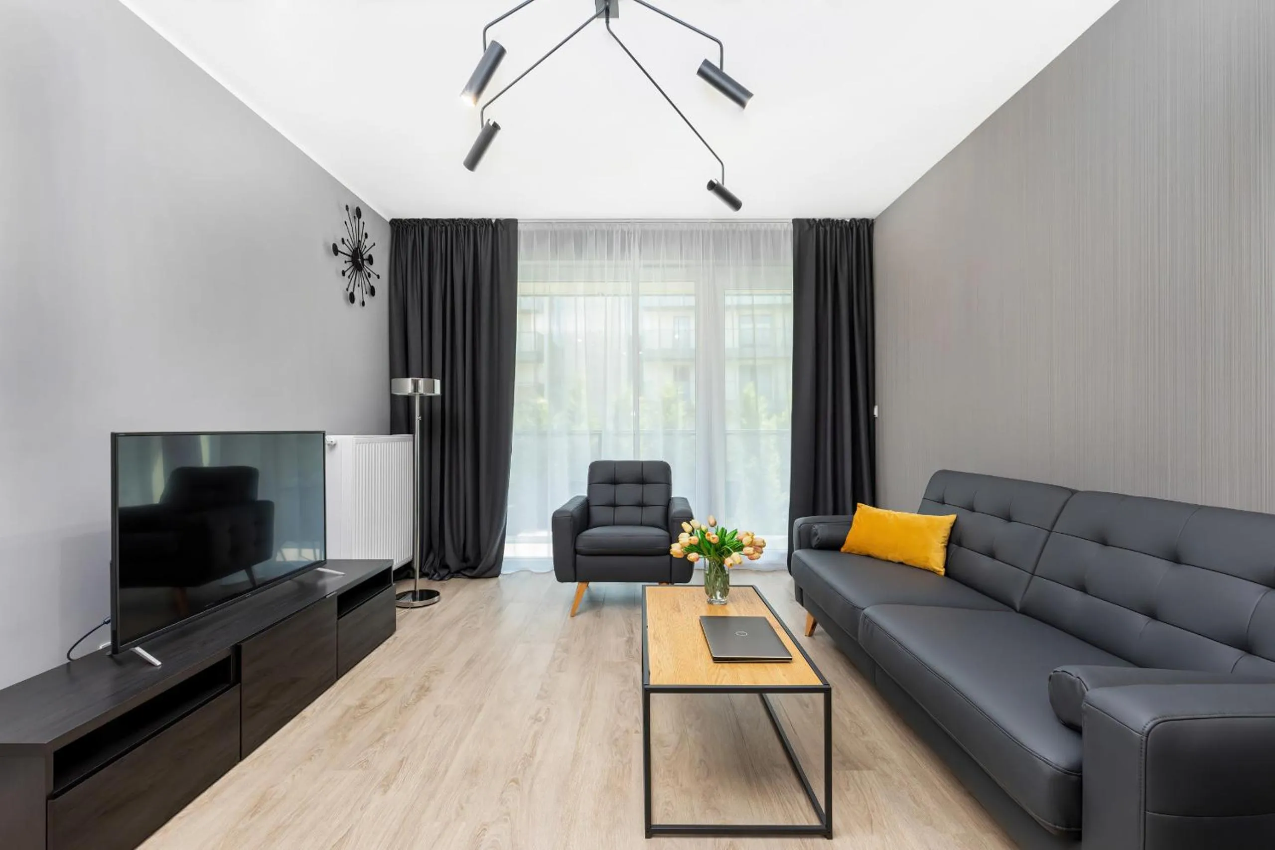 Living room in Modern City Center Apartments by Noclegi Renters