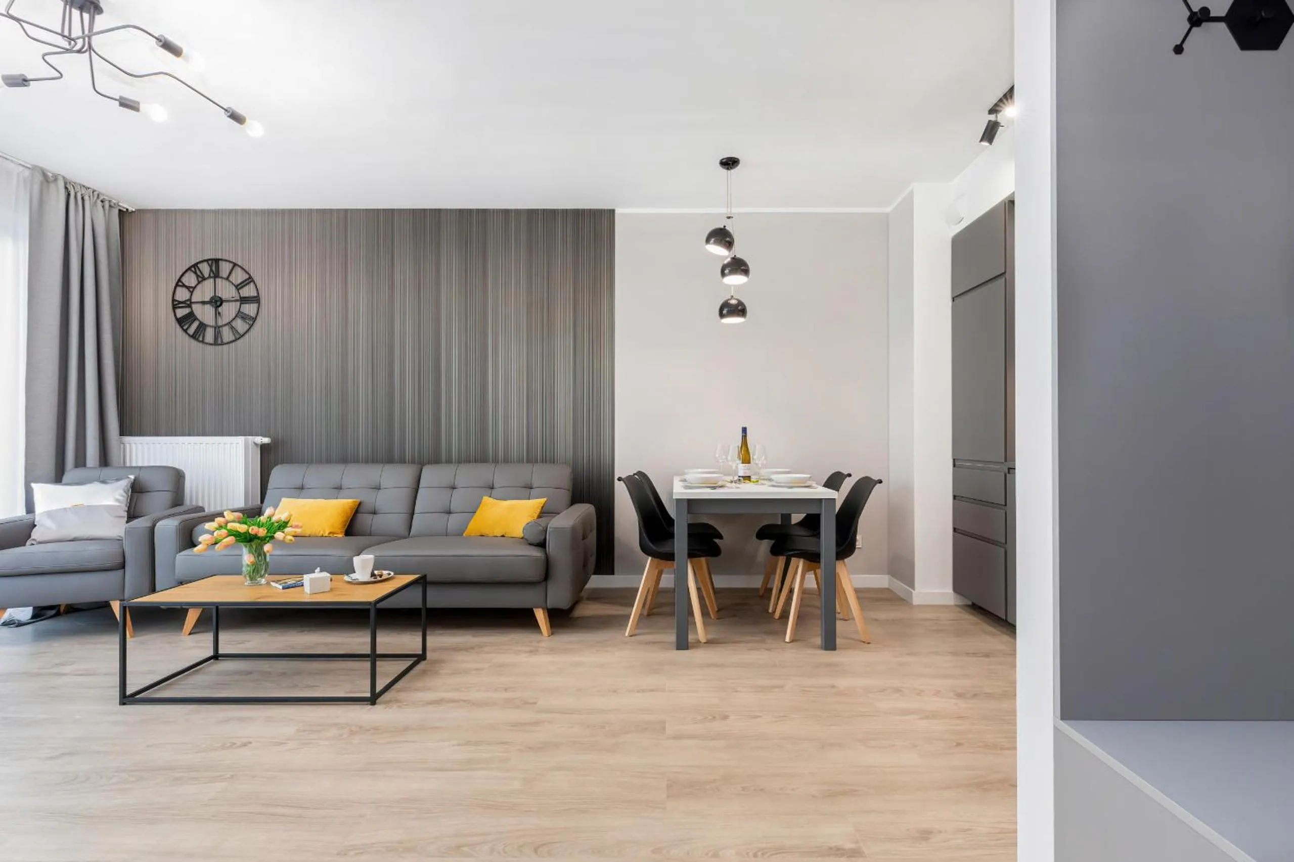 Living room in Modern City Center Apartments by Noclegi Renters