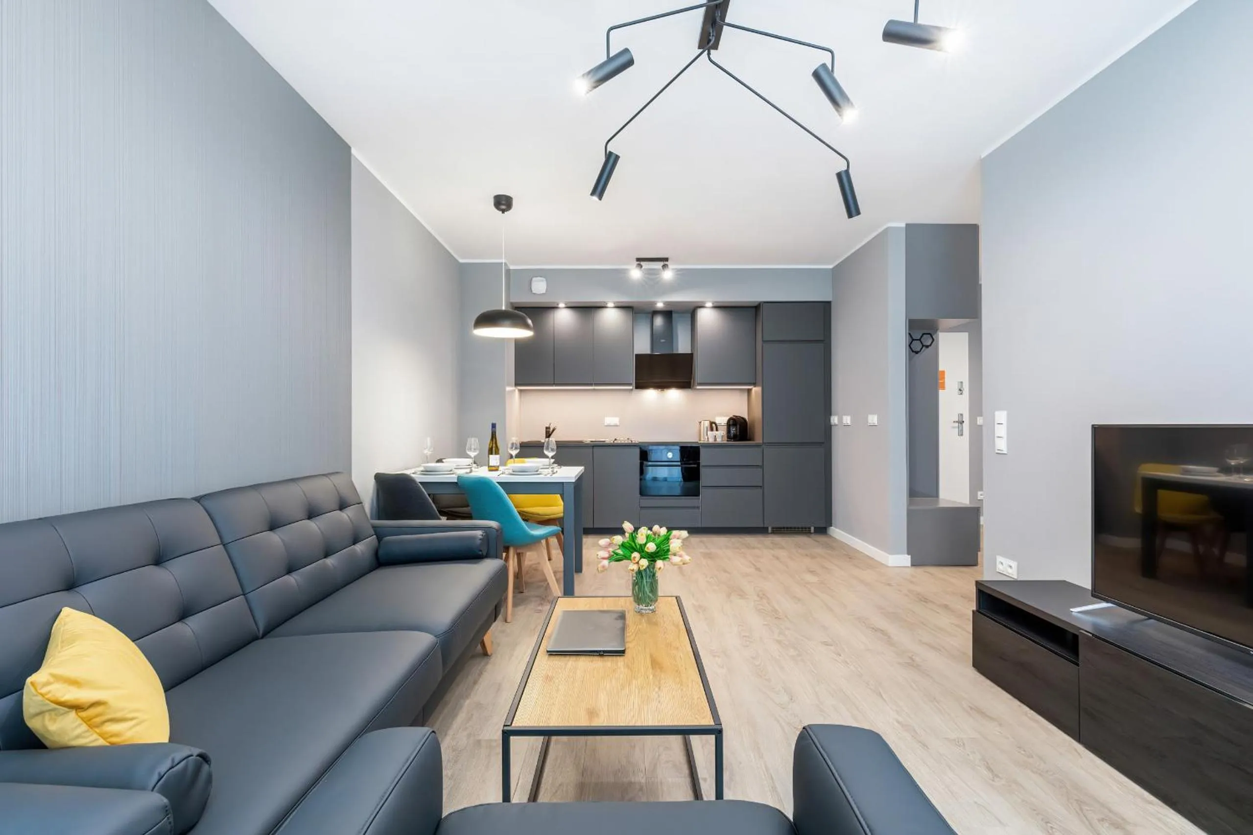 Living room in Modern City Center Apartments by Noclegi Renters