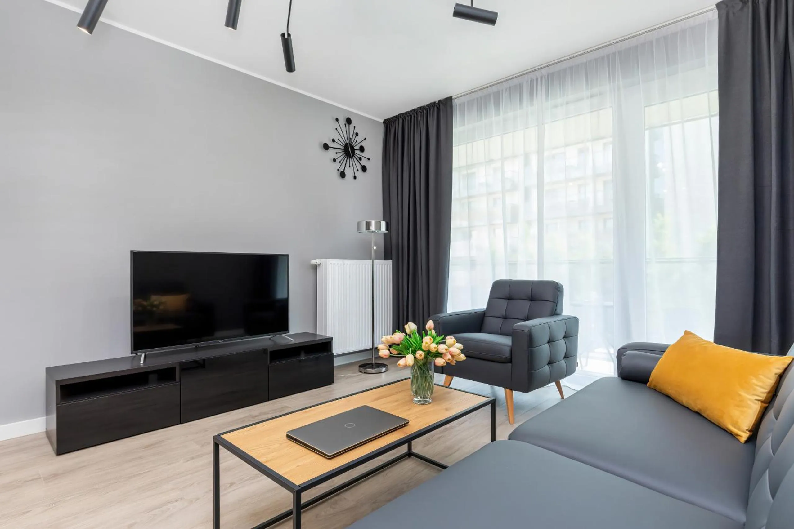 Living room in Modern City Center Apartments by Noclegi Renters