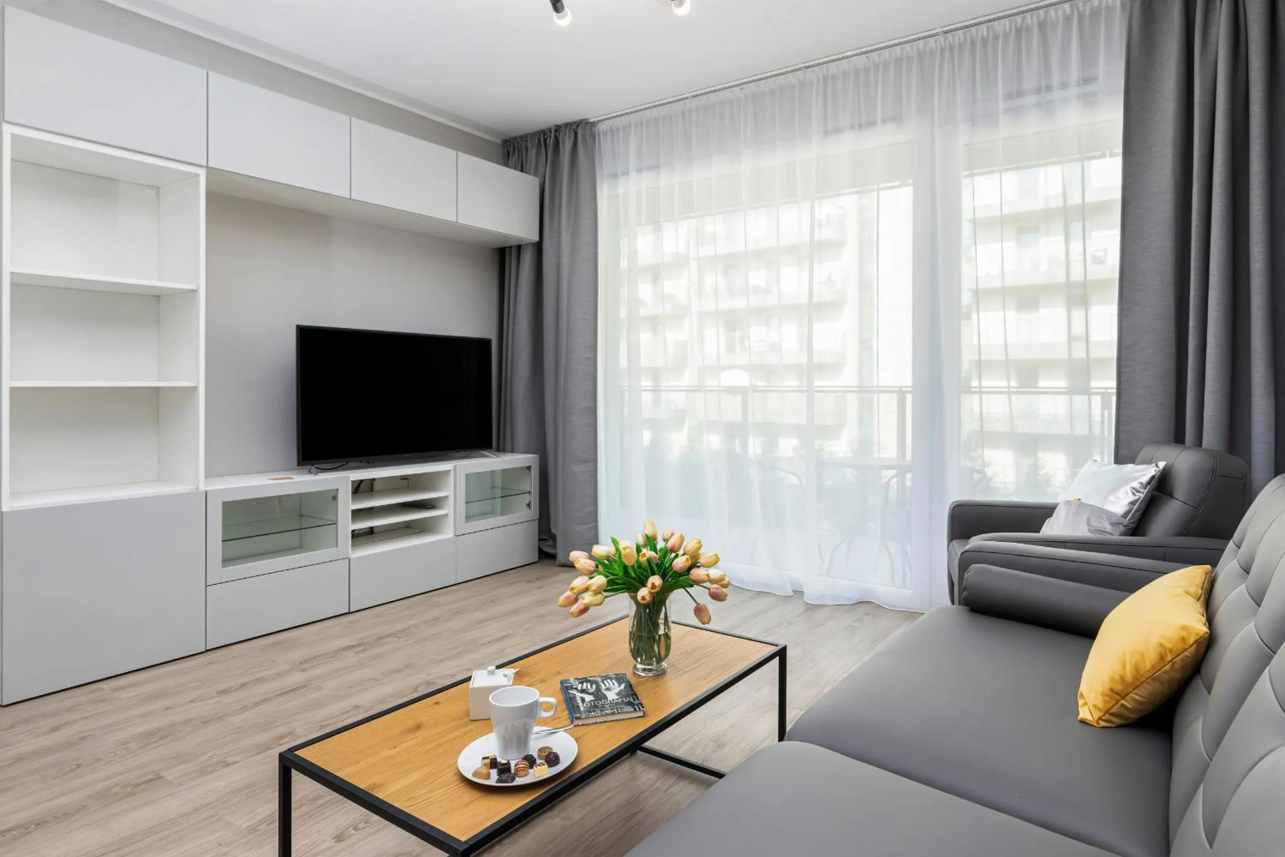 Living room in Modern City Center Apartments by Noclegi Renters
