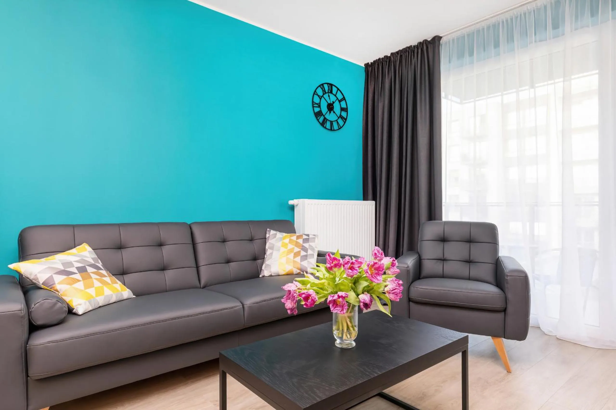 Living room in Modern City Center Apartments by Noclegi Renters