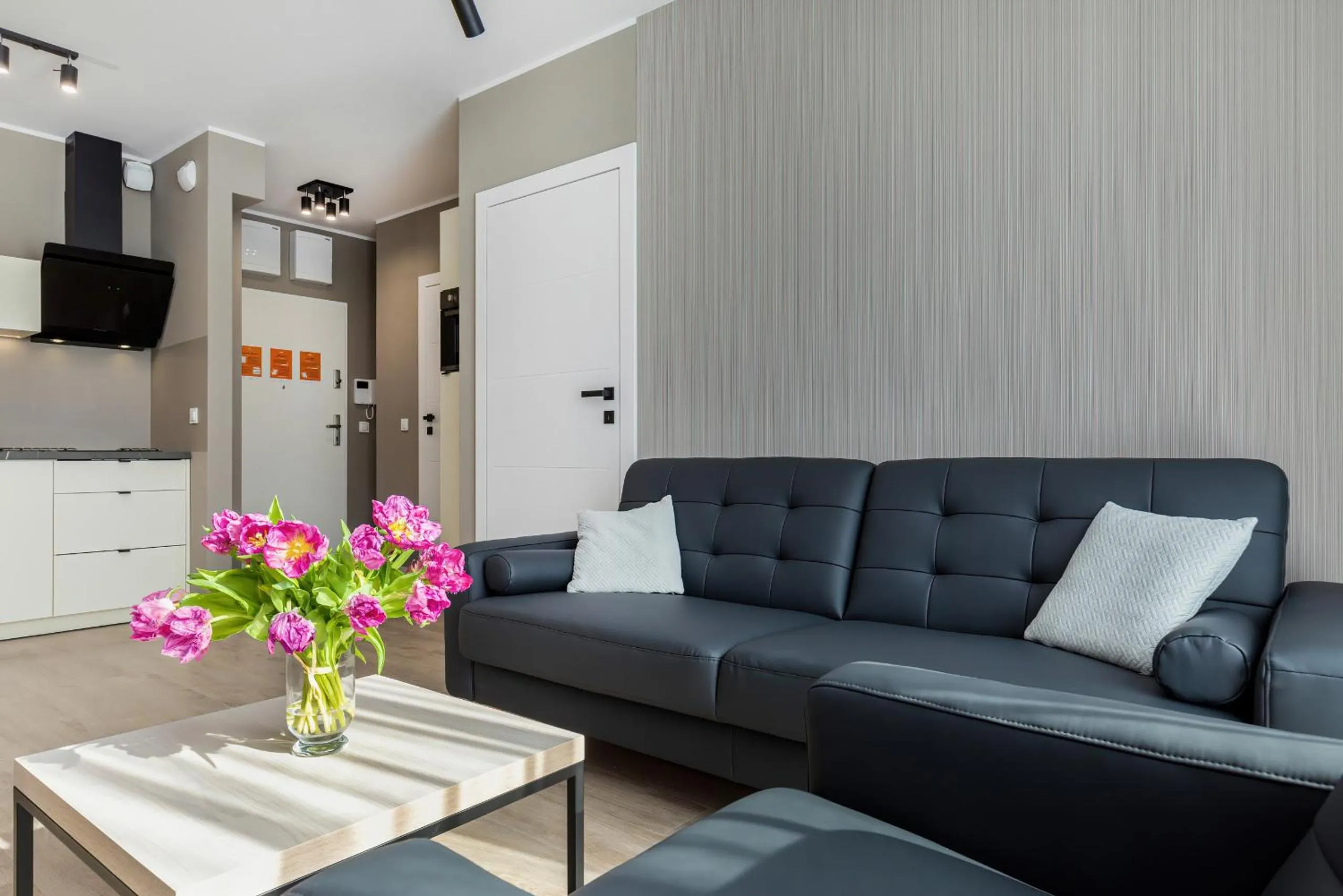 Living room in Modern City Center Apartments by Noclegi Renters