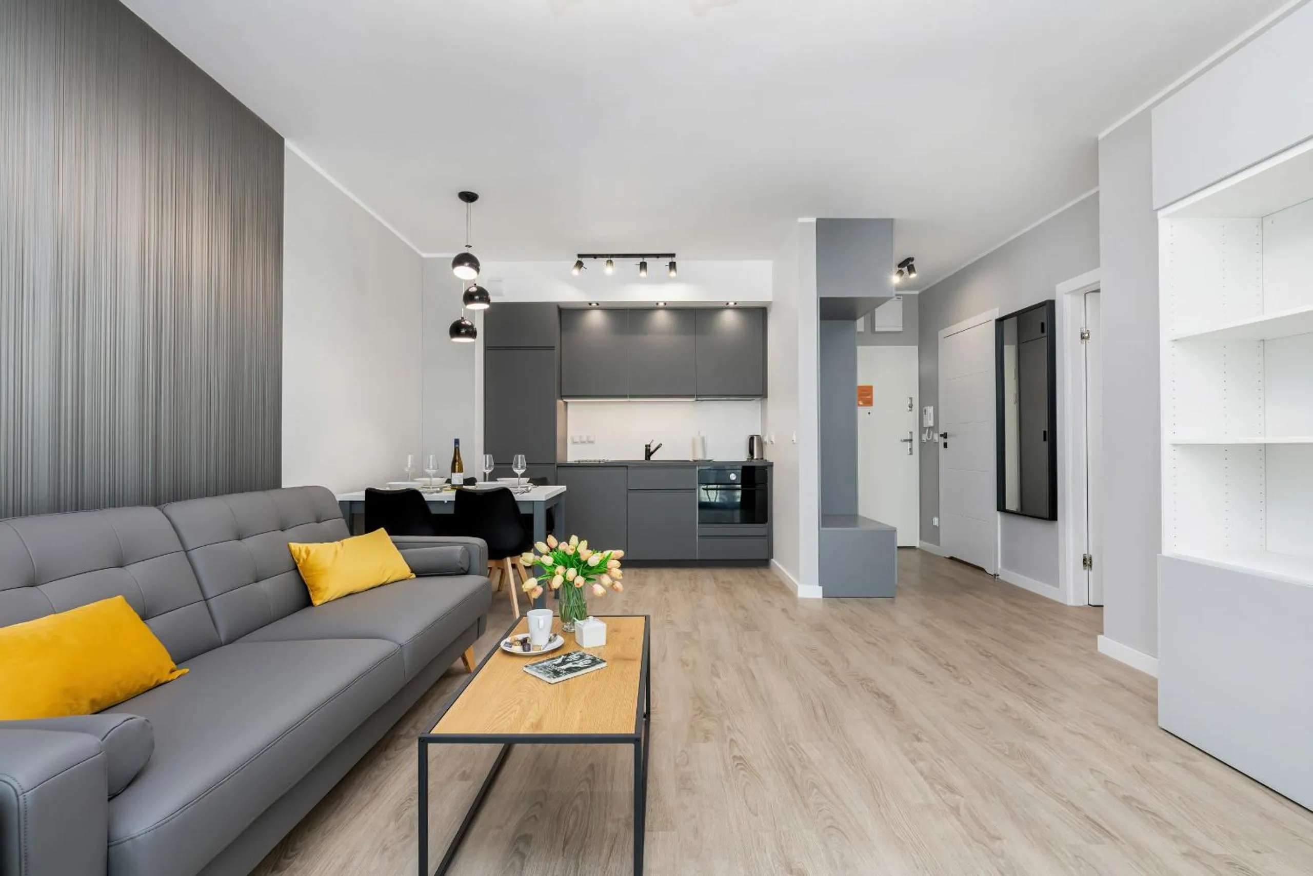 Living room in Modern City Center Apartments by Noclegi Renters
