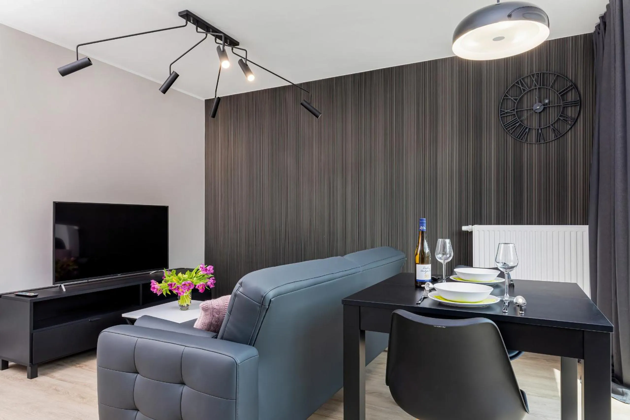 Living room in Modern City Center Apartments by Noclegi Renters