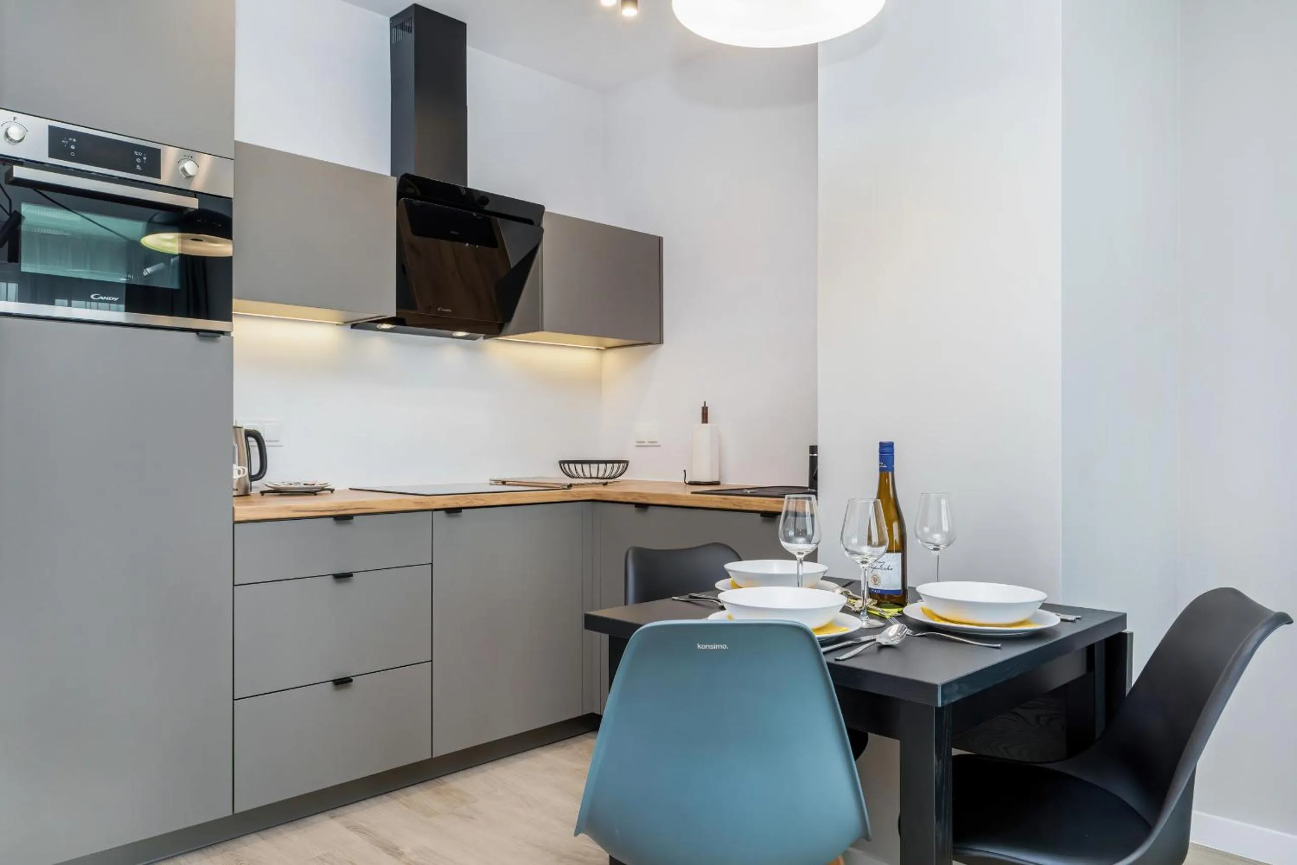 Kitchen or kitchenette in Modern City Center Apartments by Noclegi Renters