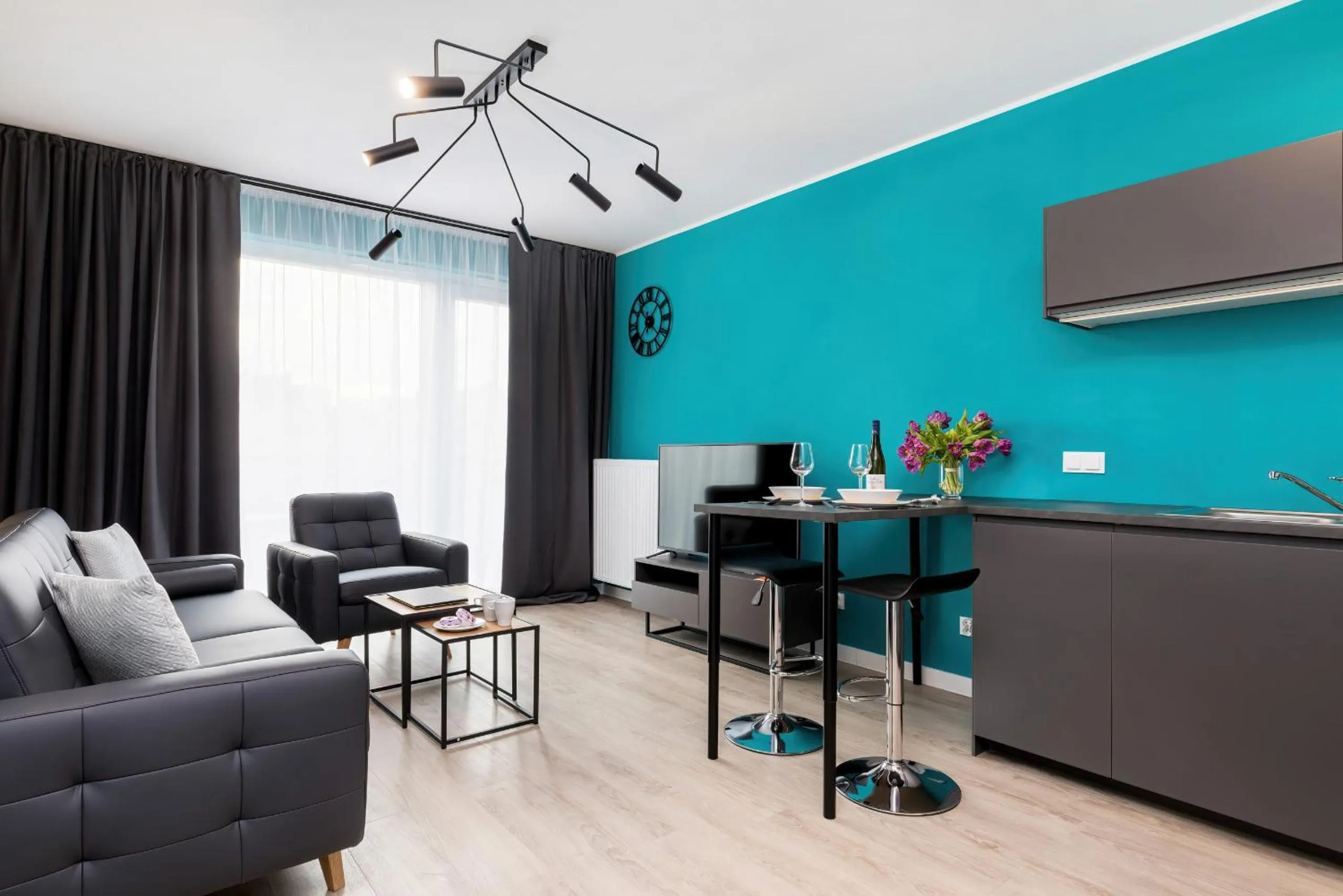 Living room in Modern City Center Apartments by Noclegi Renters