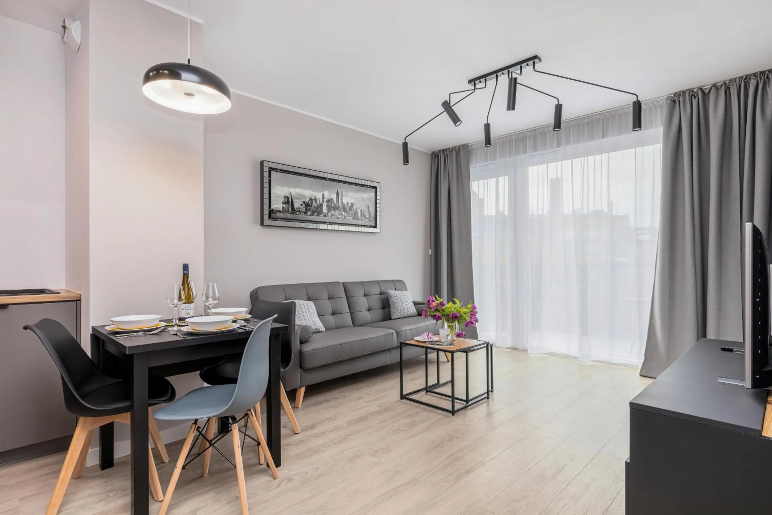 Living room in Modern City Center Apartments by Noclegi Renters