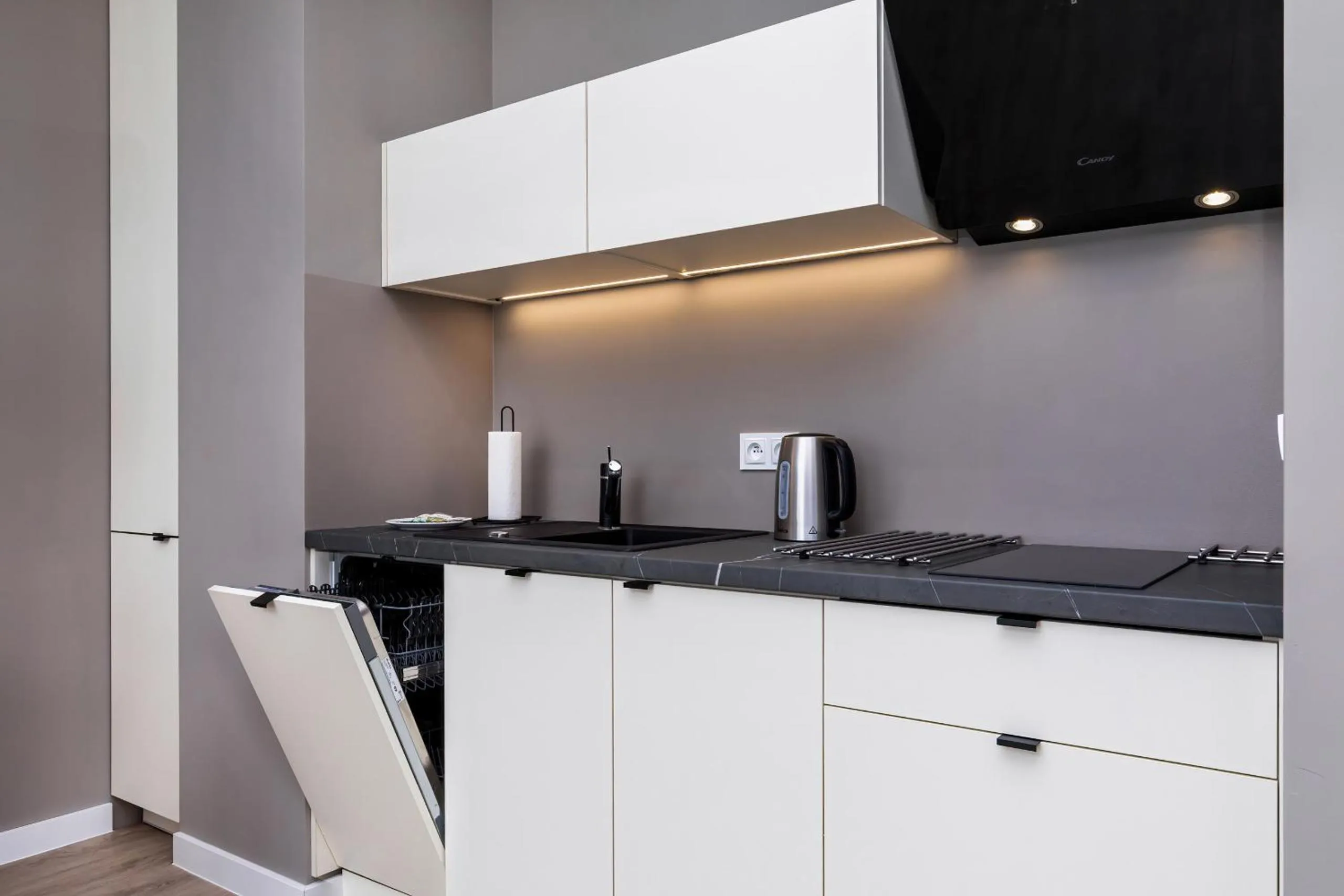 Kitchen or kitchenette in Modern City Center Apartments by Noclegi Renters