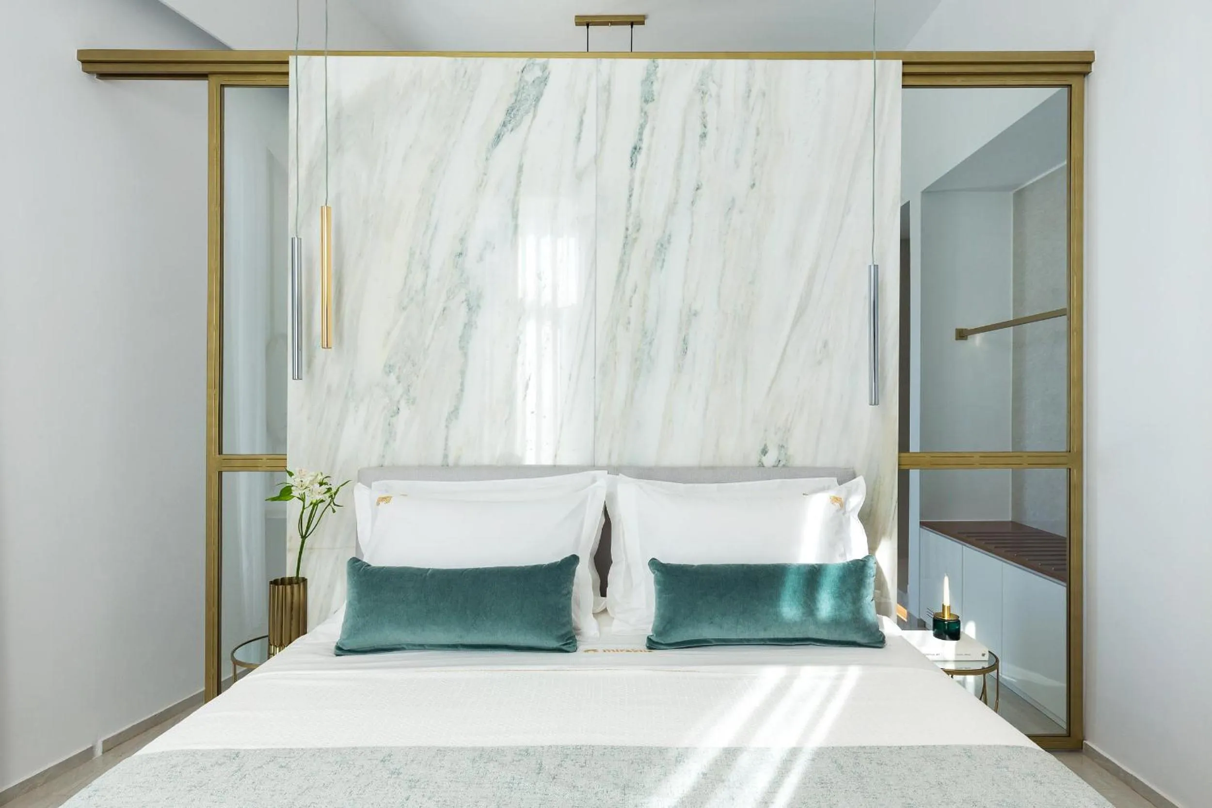 Bed in Mirabile Luxury Suites