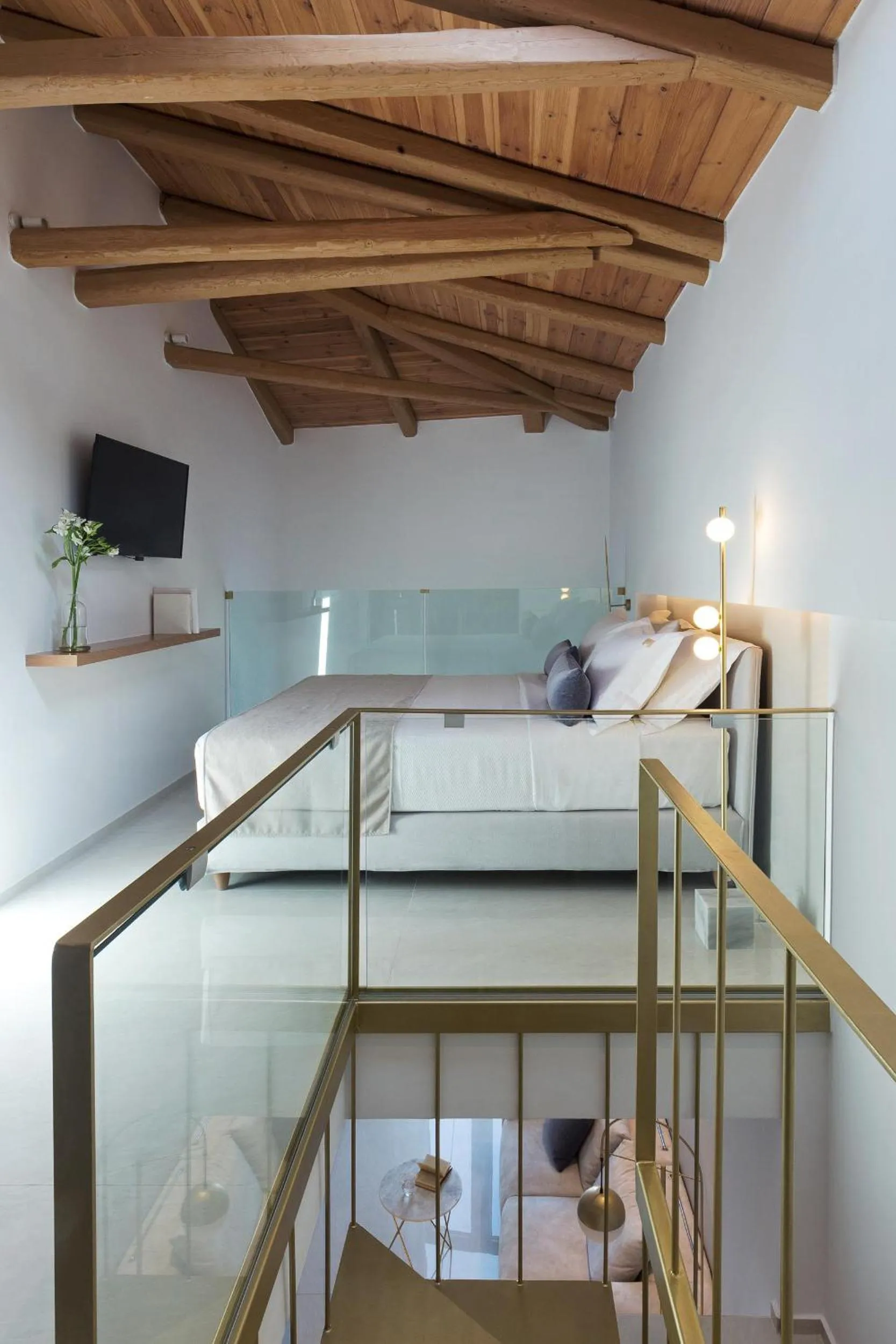 Bed in Mirabile Luxury Suites