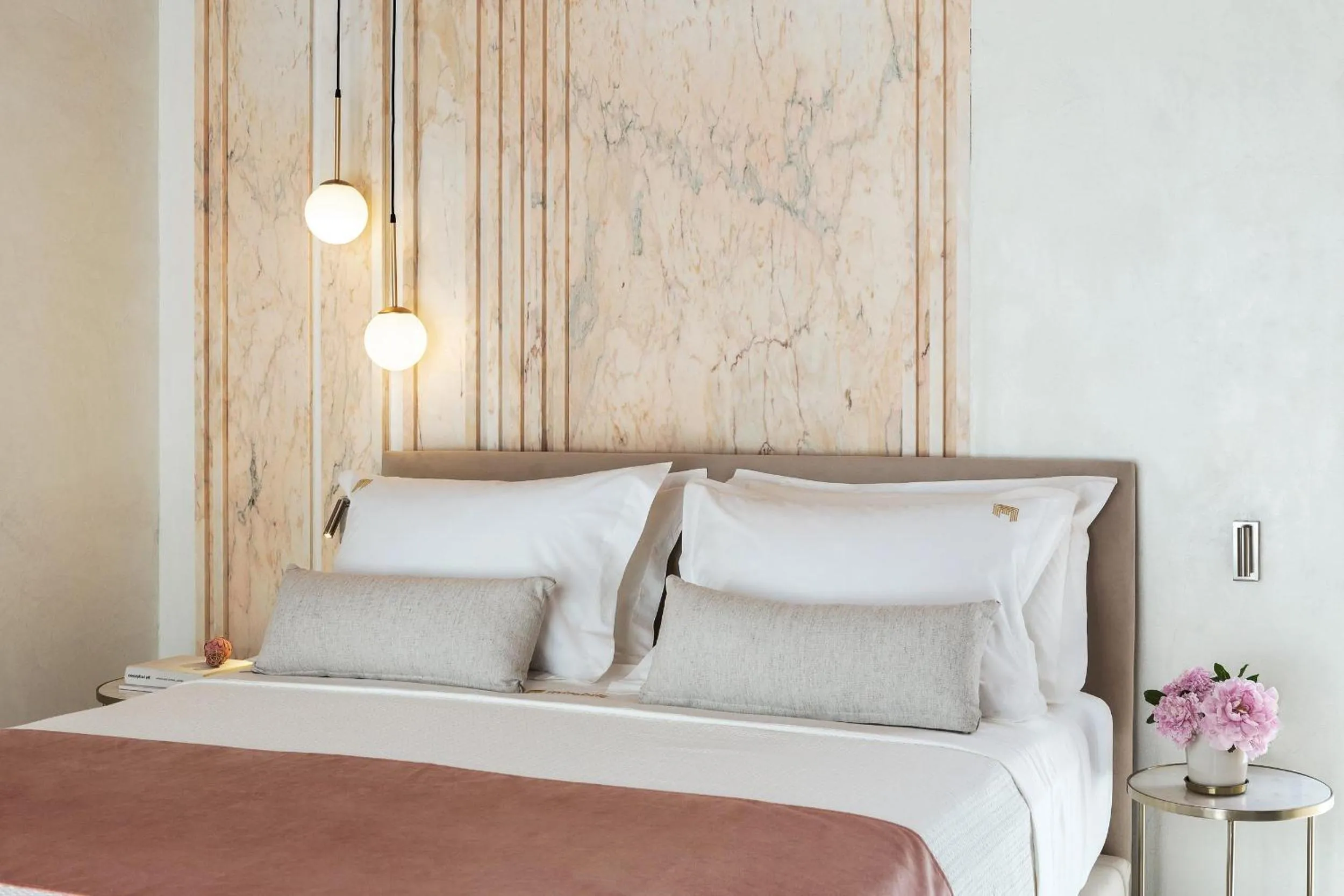 Bed in Mirabile Luxury Suites