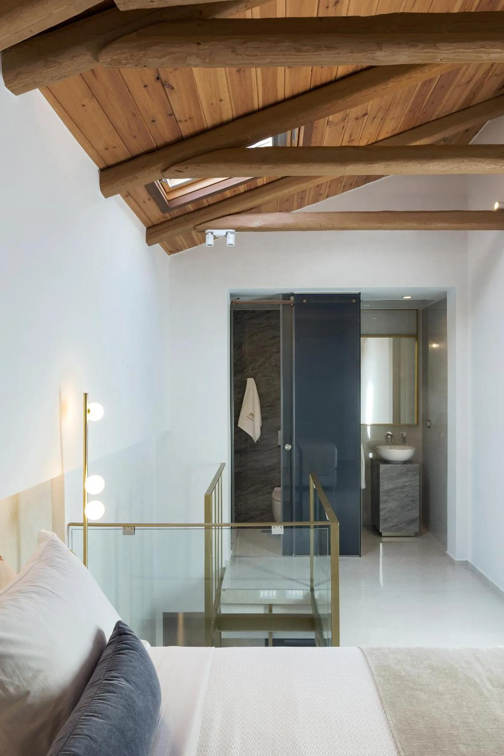 Bed in Mirabile Luxury Suites