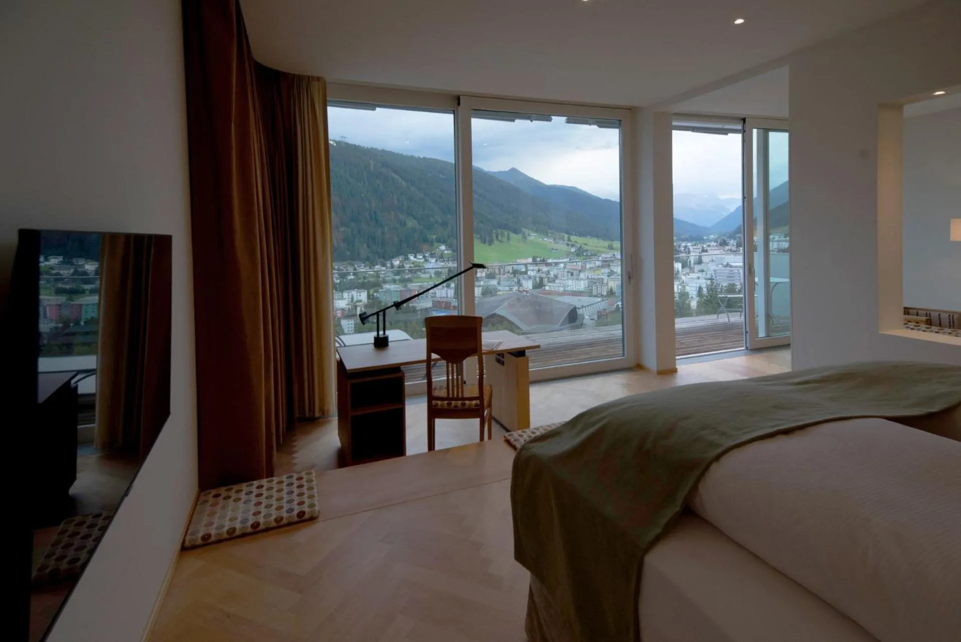 Photo of the whole room, Bed in Waldhotel & SPA Davos - for body & soul