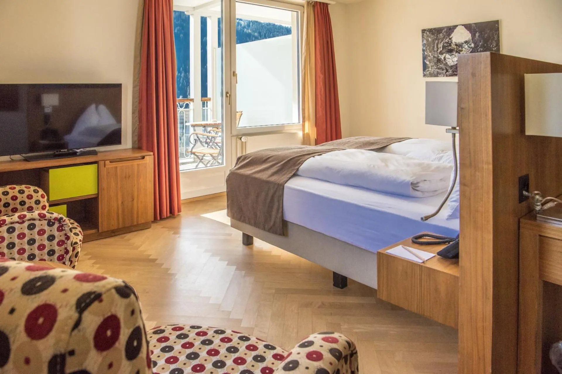 Photo of the whole room, Bed in Waldhotel & SPA Davos - for body & soul