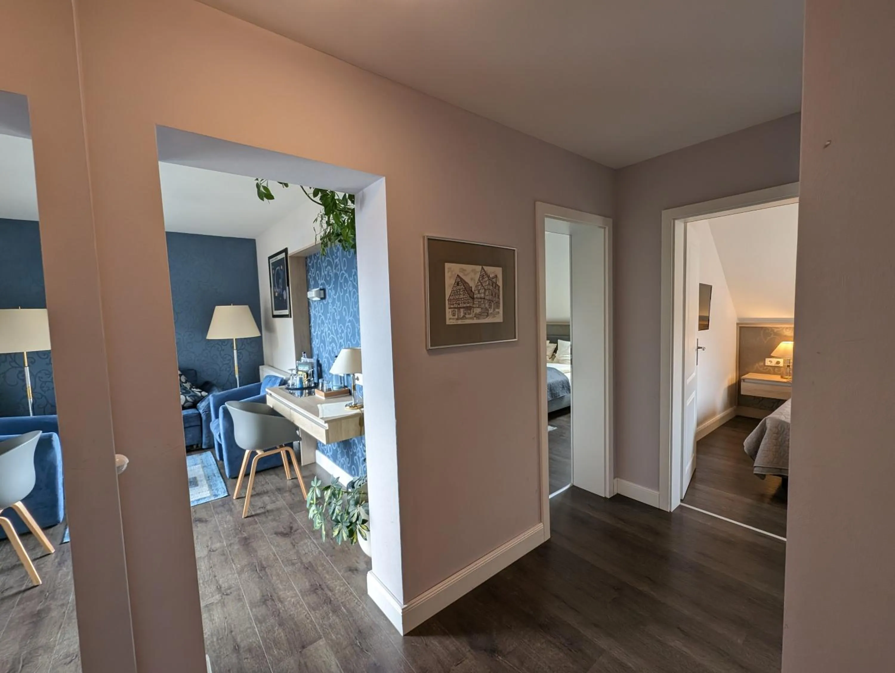 Living room, Bed in Weinhotel St. Stephanus