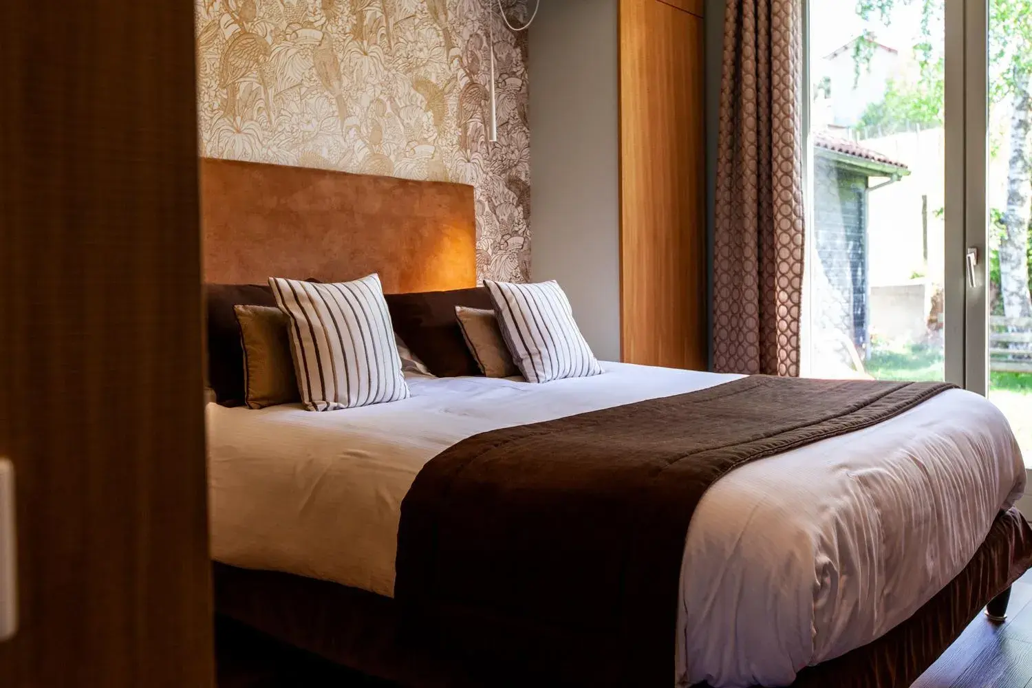 Bed in Logis Hotel Restaurant La Tour Bed in Logis Hotel Restaurant La Tour