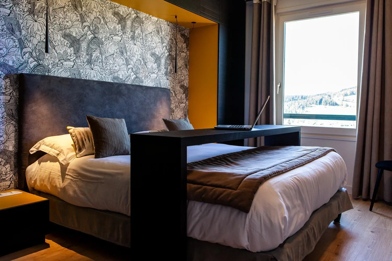 Bed in Logis Hotel Restaurant La Tour