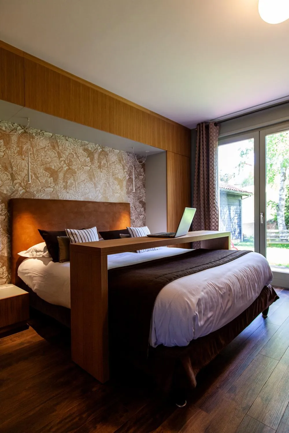 Bed in Logis Hotel Restaurant La Tour