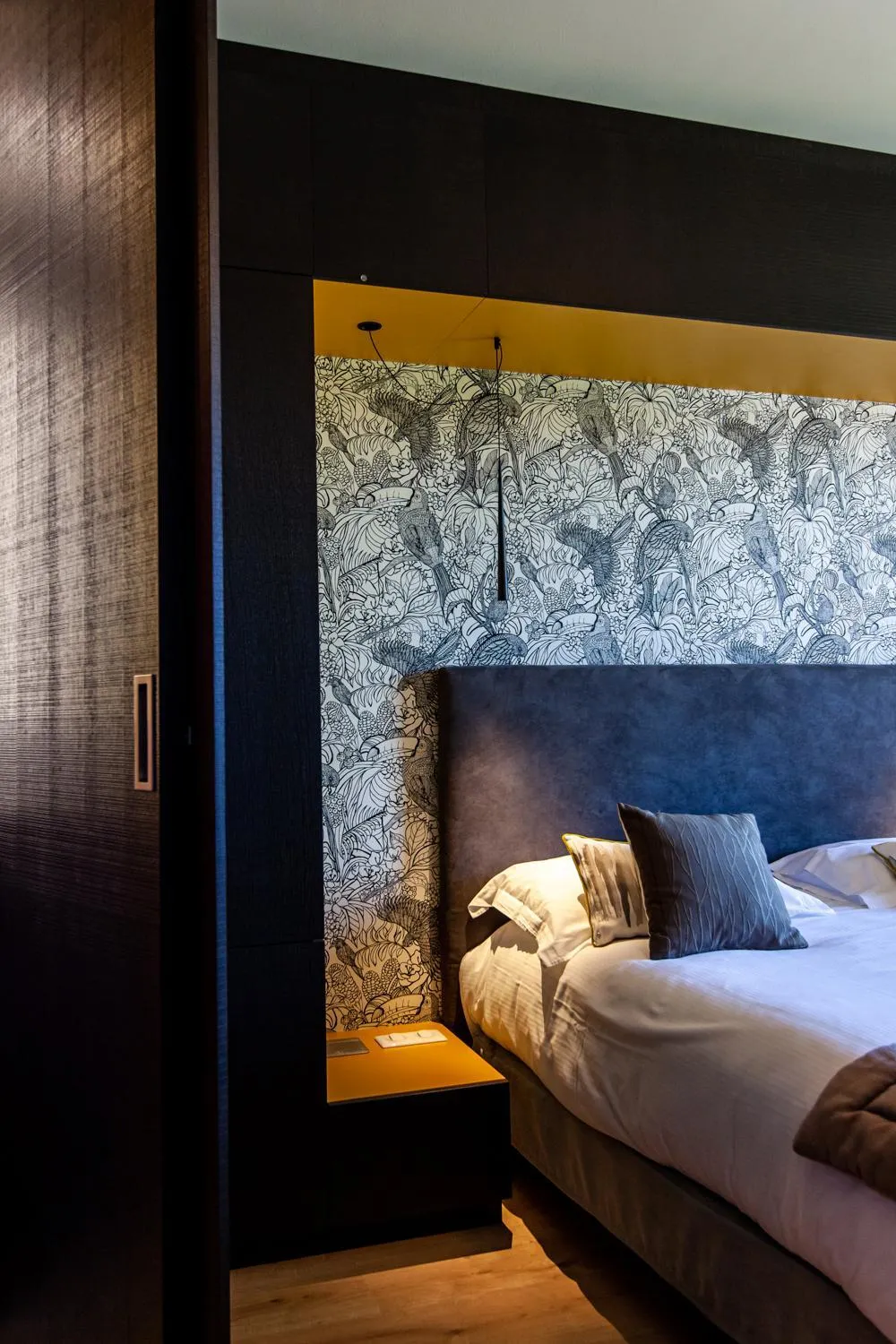 Bed in Logis Hotel Restaurant La Tour