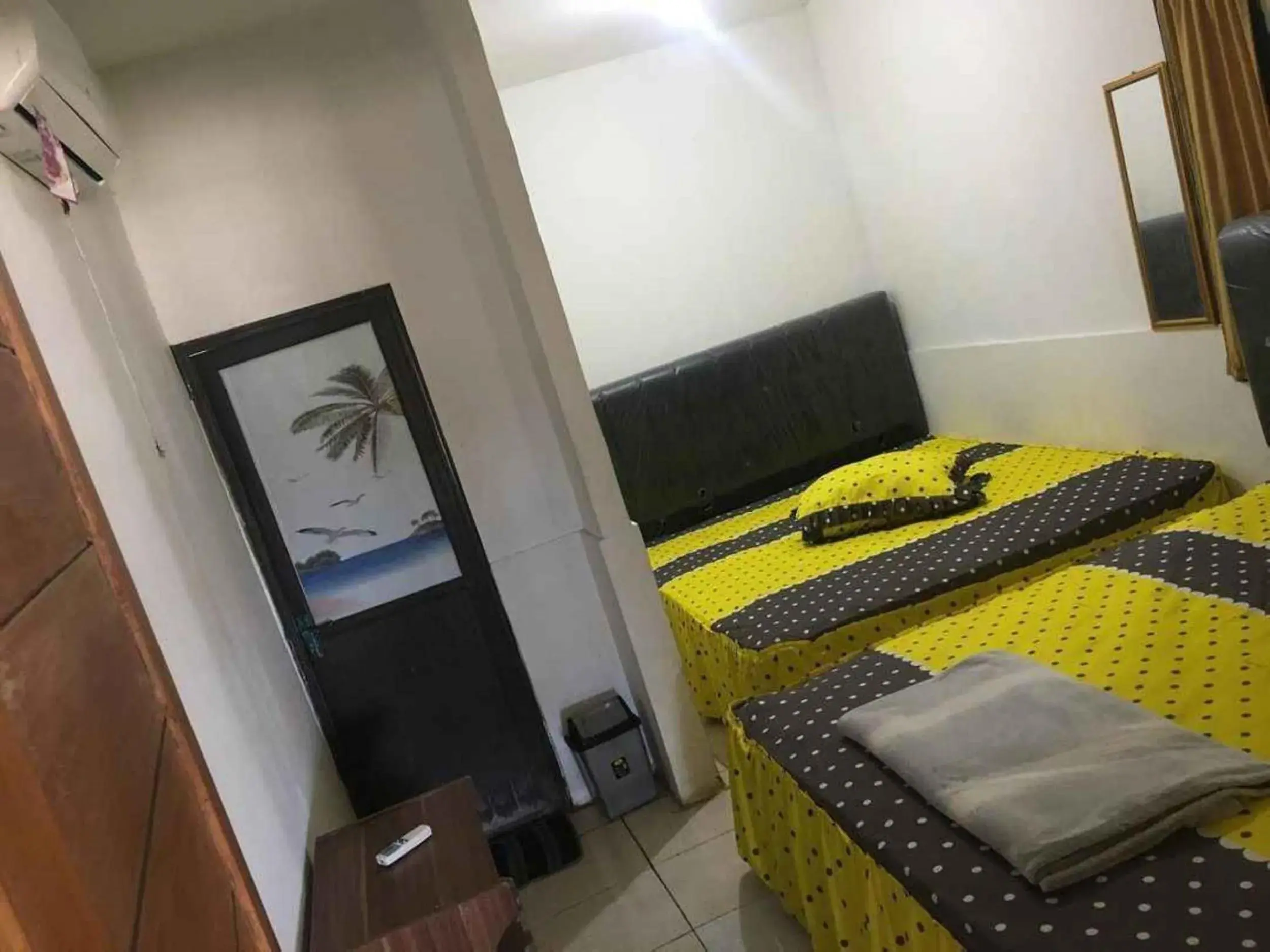 Deluxe Quadruple Room in Penginapan Erbysa Deluxe Quadruple Room in Penginapan Erbysa