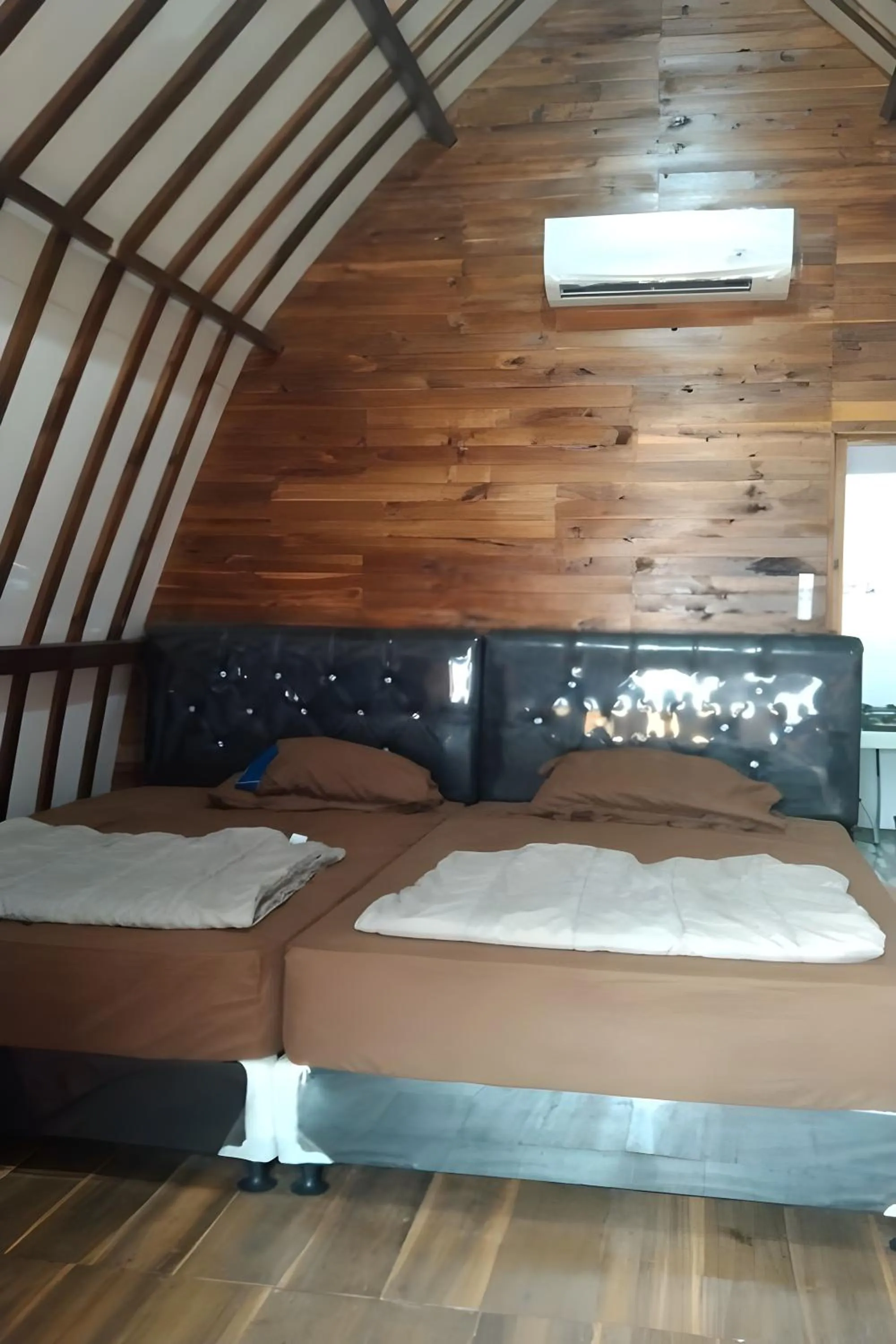 Bed in Penginapan Erbysa