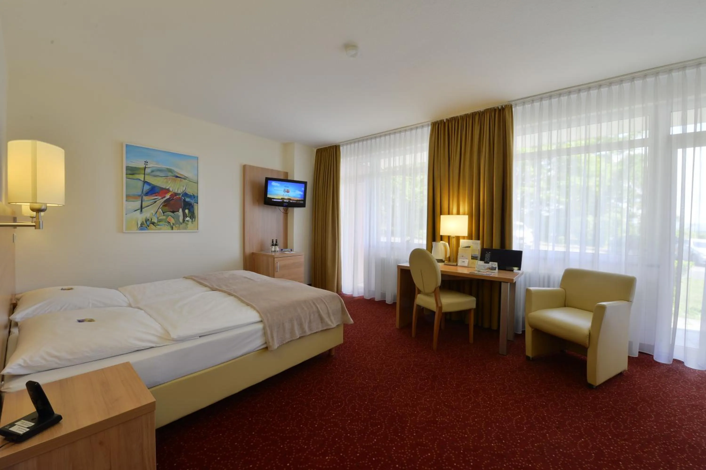 Photo of the whole room, Bed in Ringhotel Haus Oberwinter