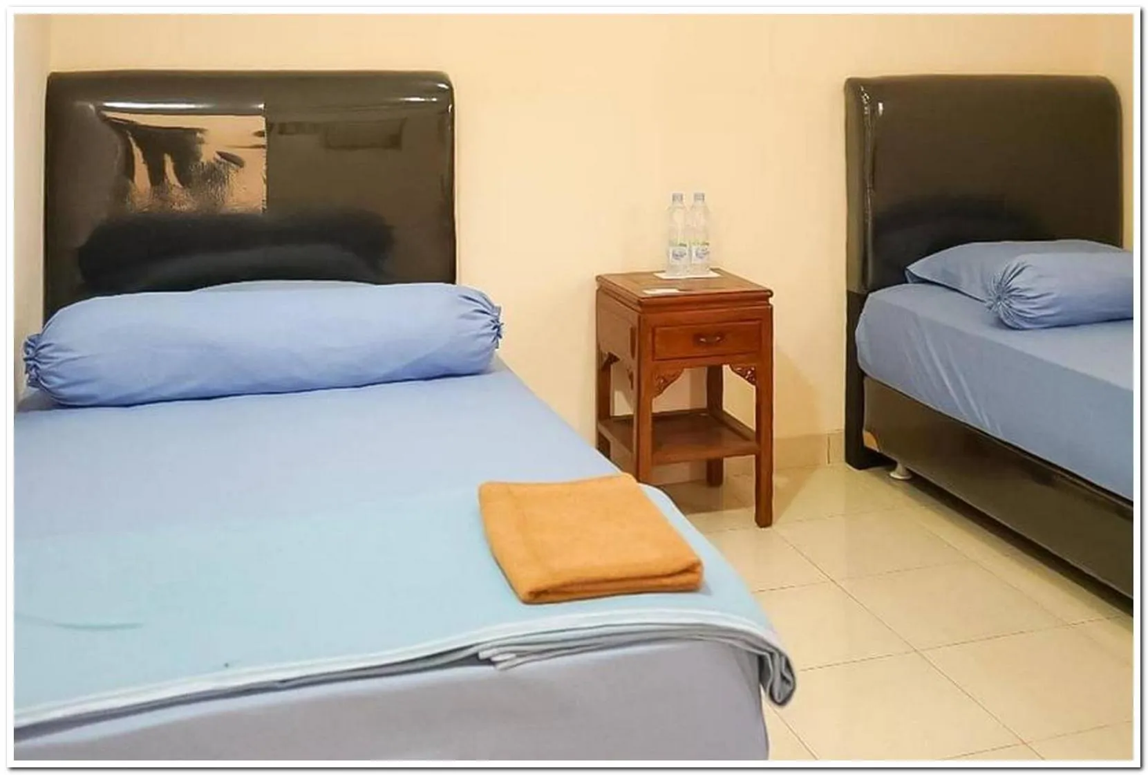 Bed in Pondok Malabar Mitra RedDoorz