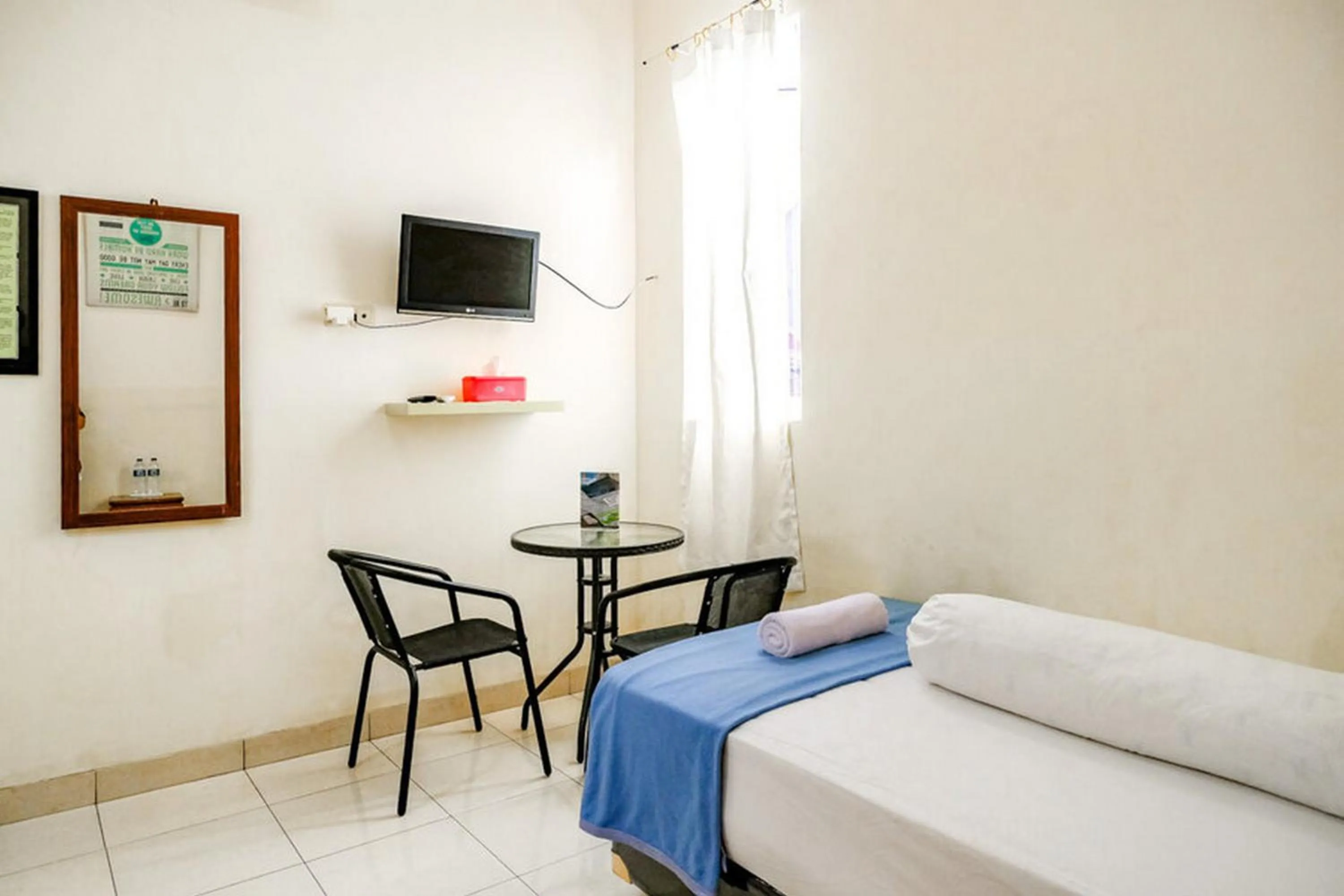 Bed in Pondok Malabar Mitra RedDoorz