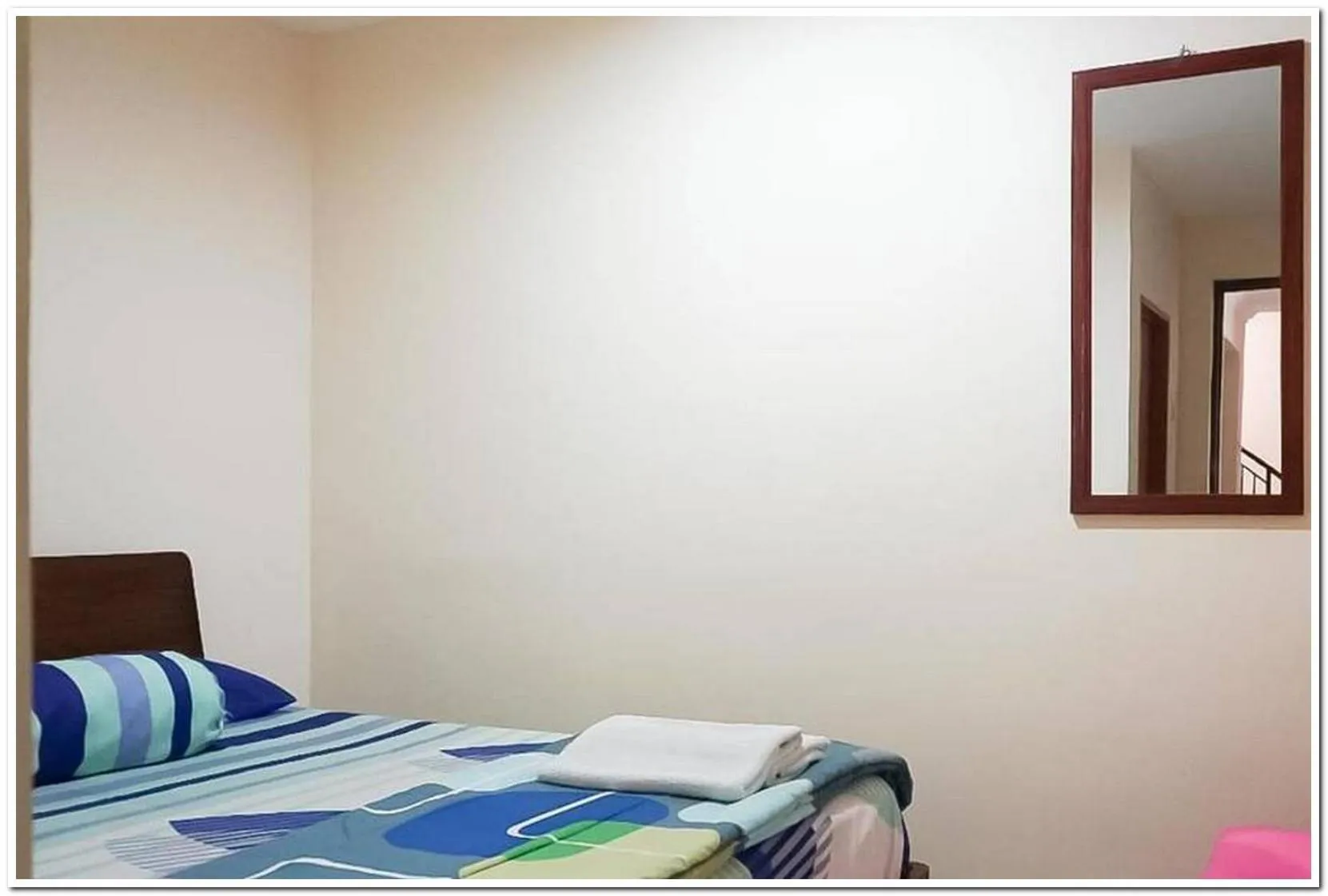 Bed in Pondok Malabar Mitra RedDoorz