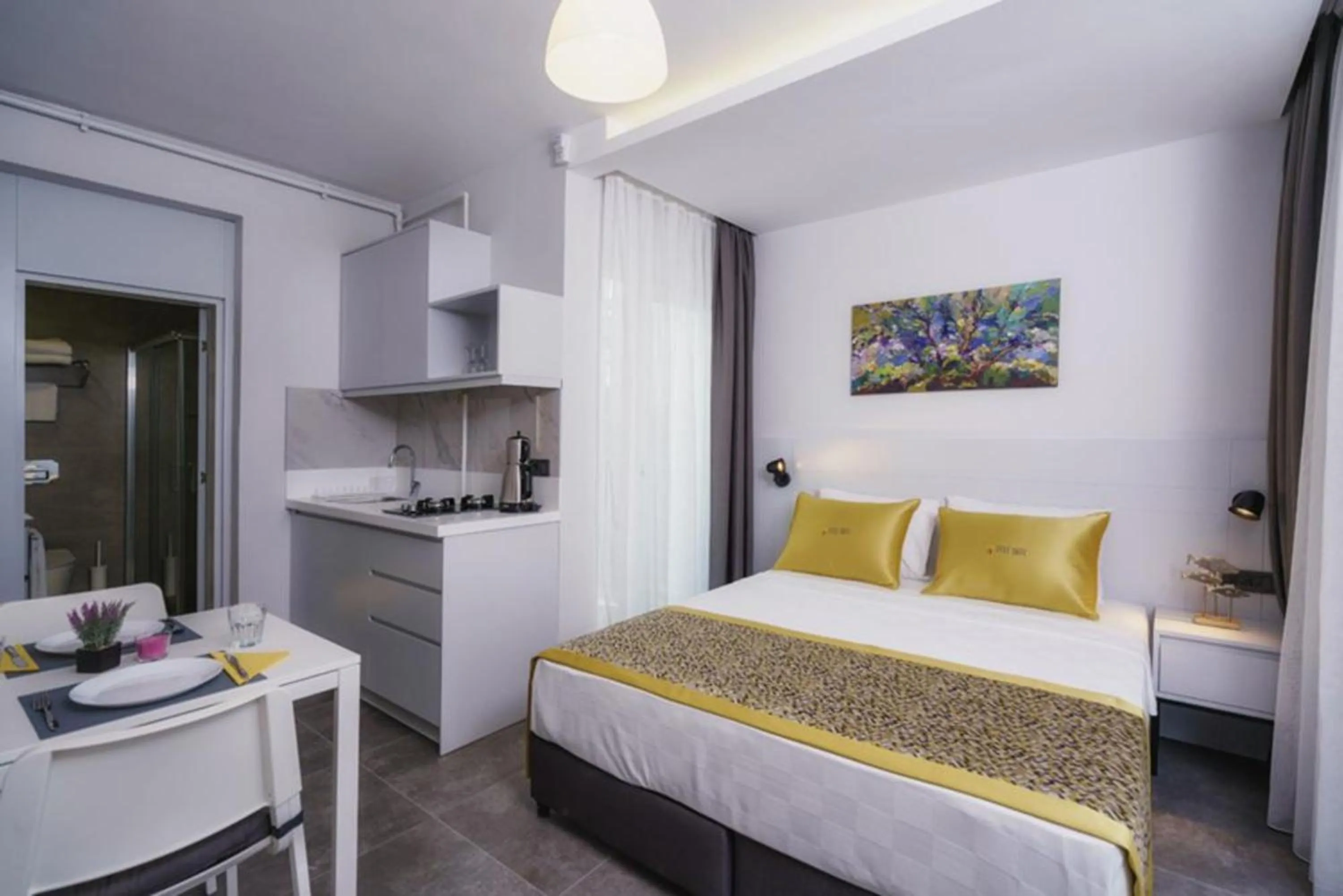 Bed in Stile Suite Family Hotel