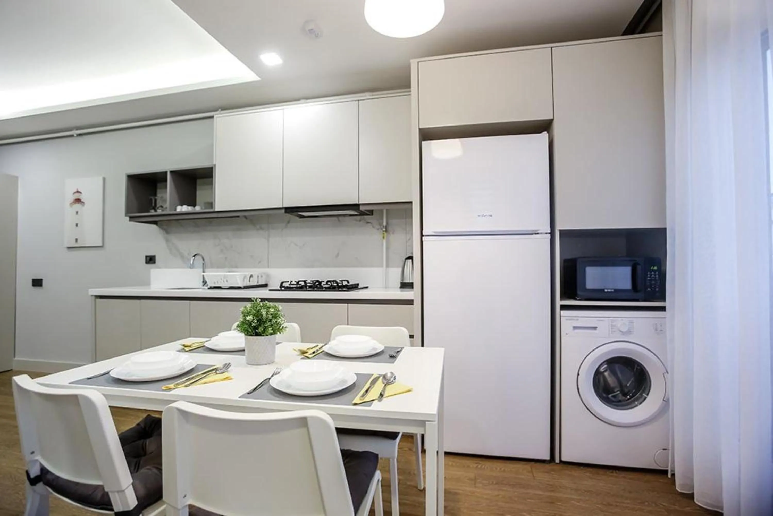 Kitchen or kitchenette in Stile Suite Family Hotel