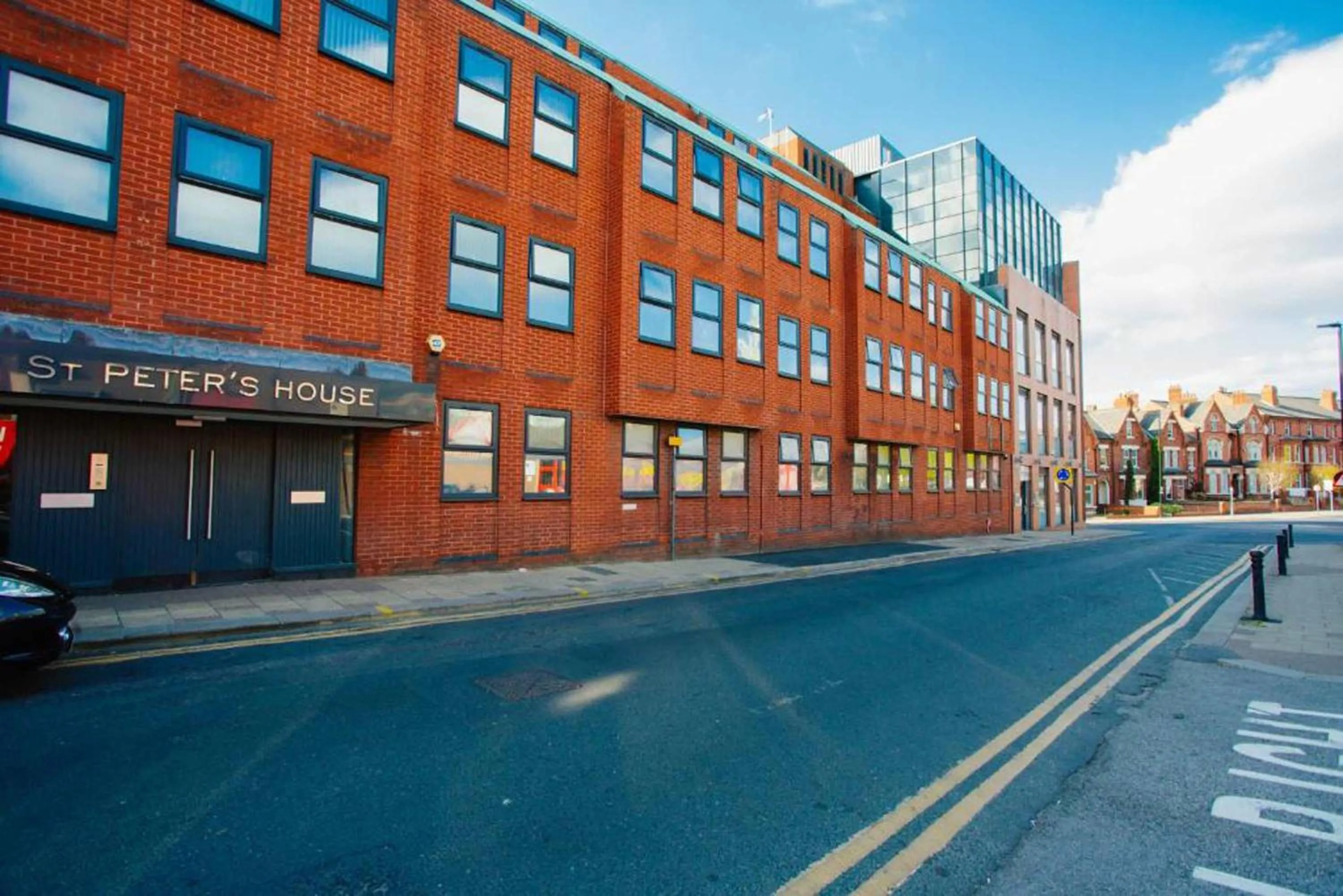 Property building in Cosy Executive City Apartment