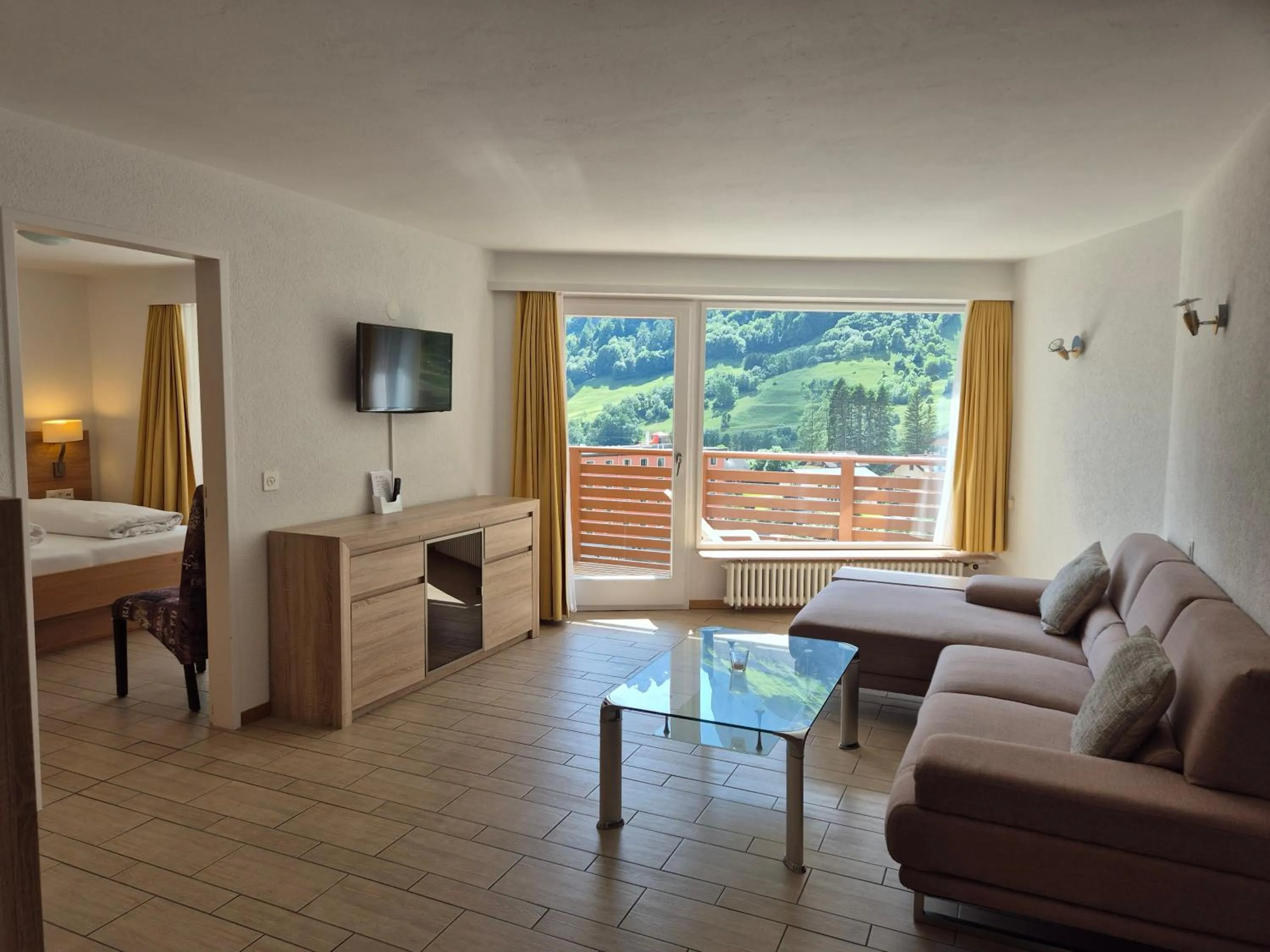 Living room, Bed in dala Hotel & Apartments