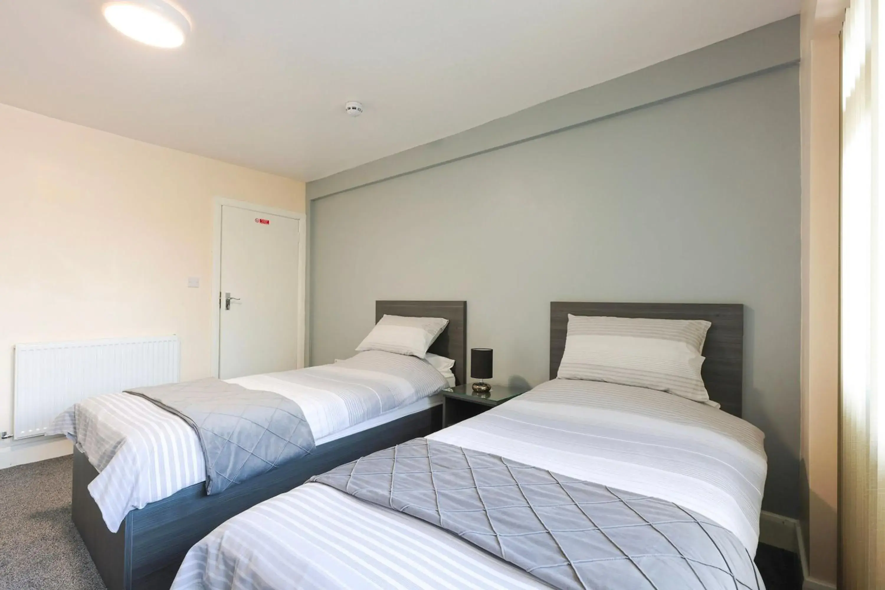 Standard Twin Room with Shared Bathroom in OYO Honeycroft Lodge Standard Twin Room with Shared Bathroom in OYO Honeycroft Lodge