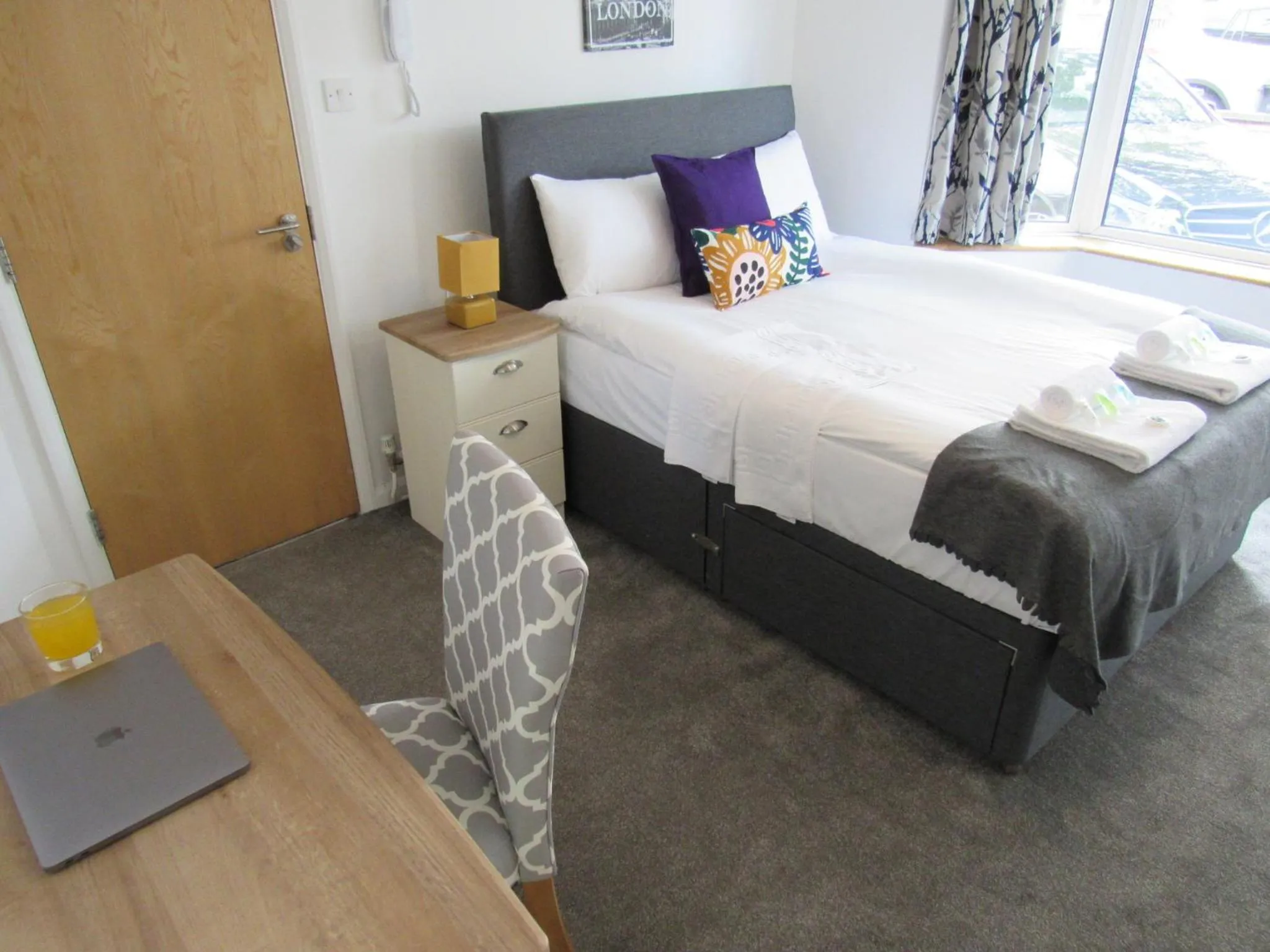 Bed in The Cambridge Suites - Tas Accommodations