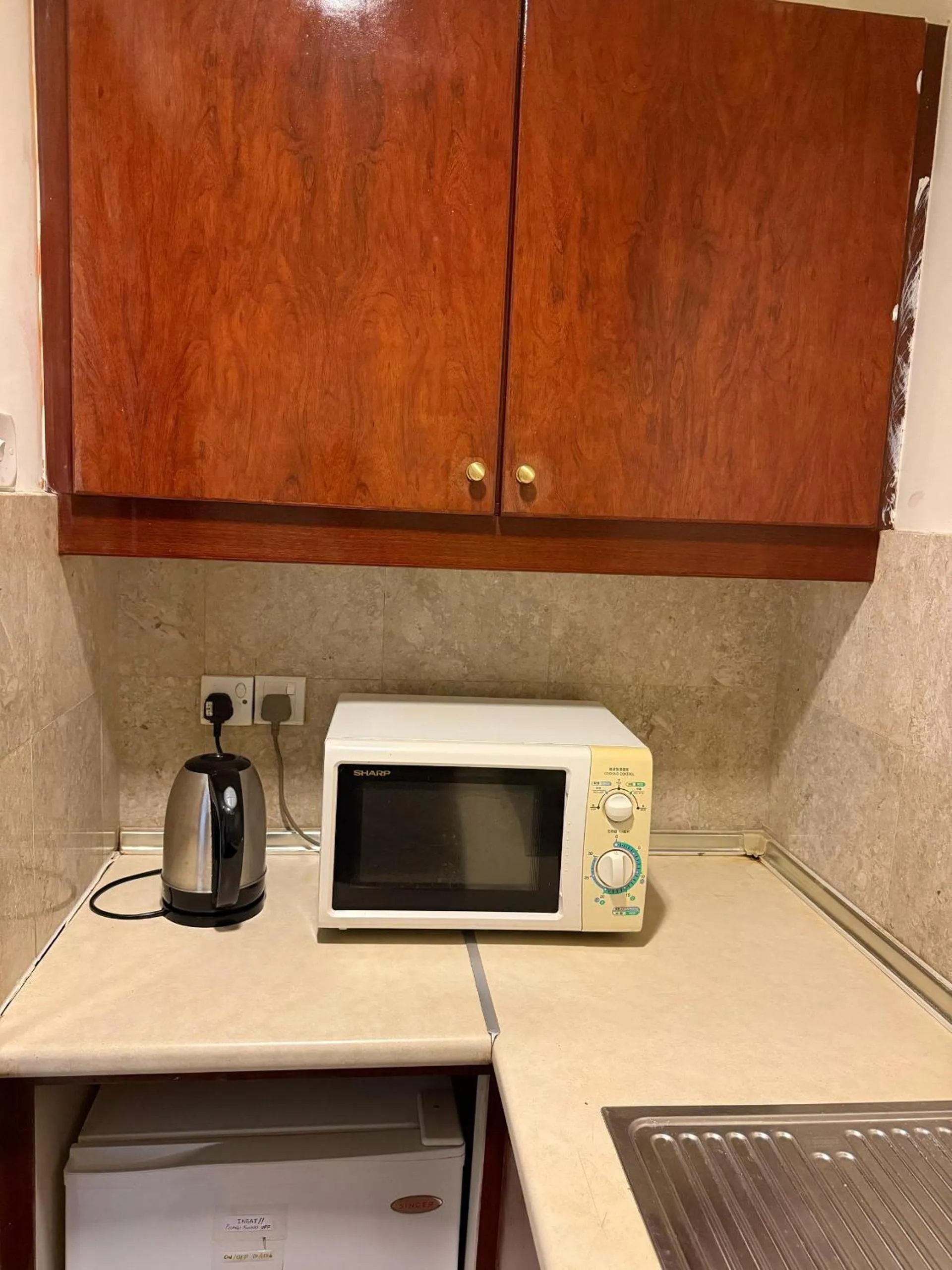 Kitchen or kitchenette in KL Universal Suites at Times Square