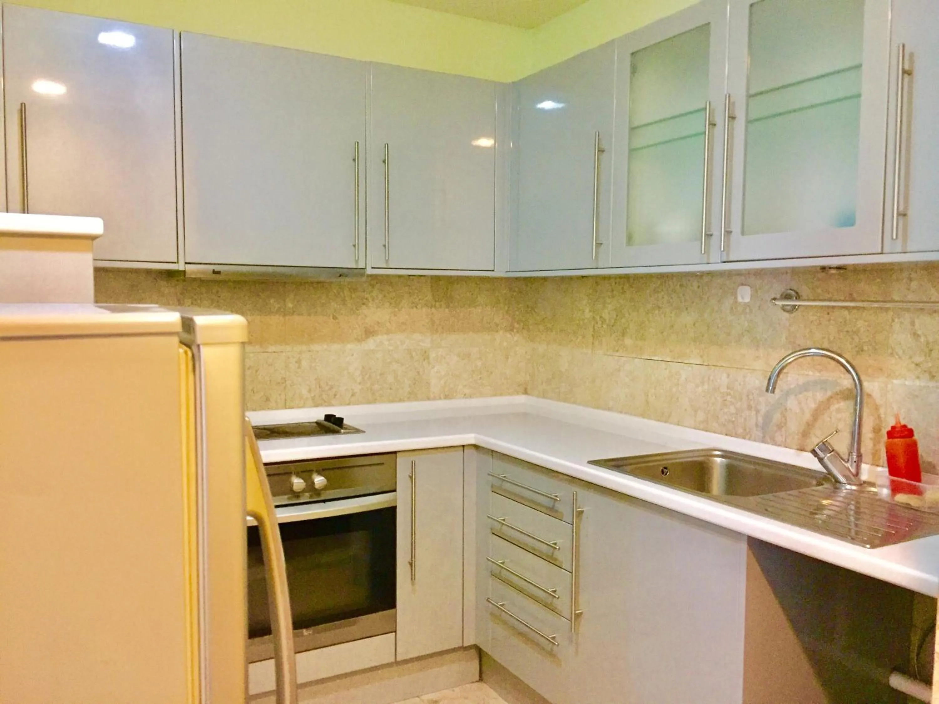 Kitchen or kitchenette in KL Universal Suites at Times Square