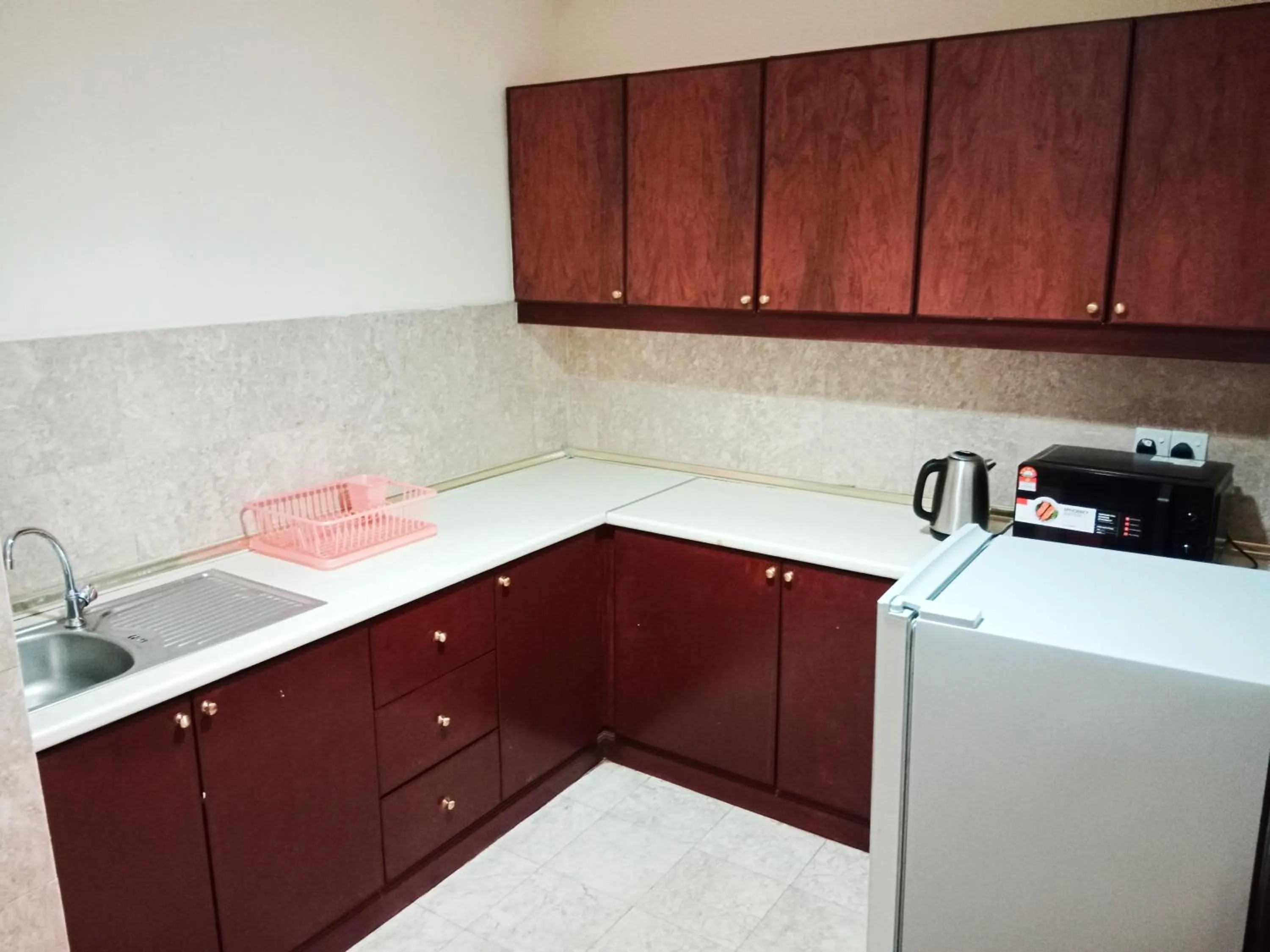 Kitchen or kitchenette in KL Universal Suites at Times Square