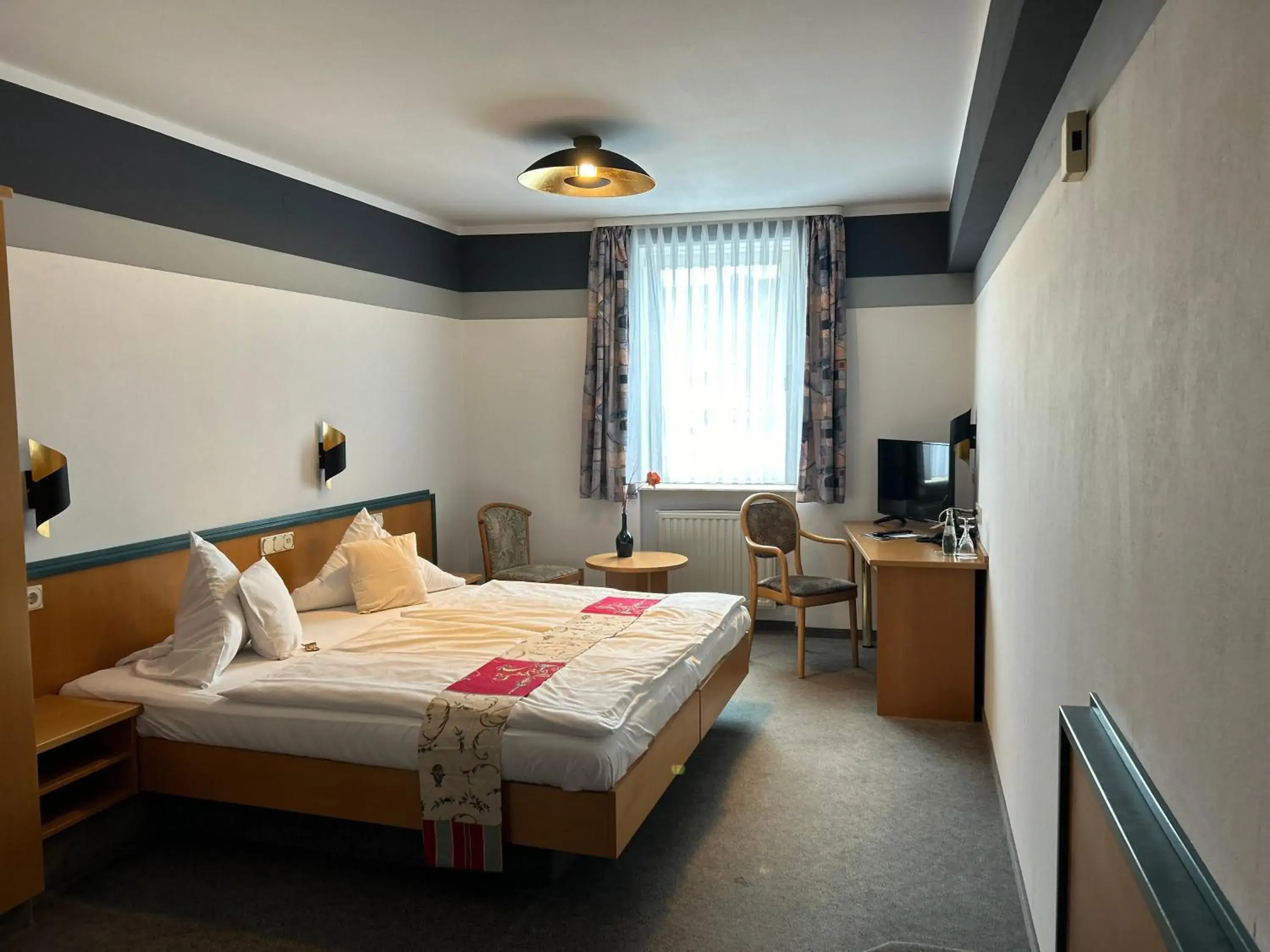 Bed in Hotel Bebra's Hessischer Hof Bed in Hotel Bebra's Hessischer Hof