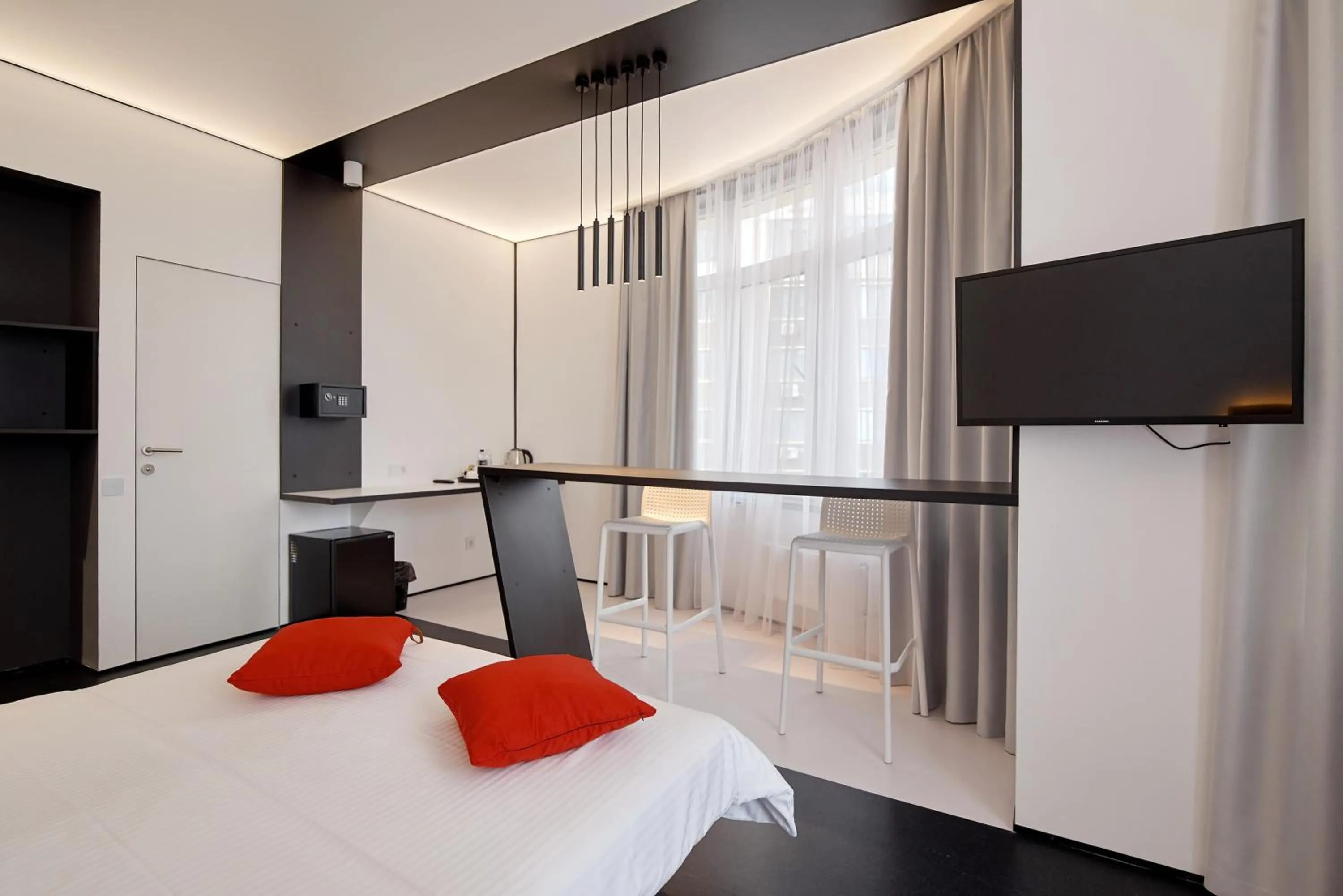 Bed in Atmosfera Hotel