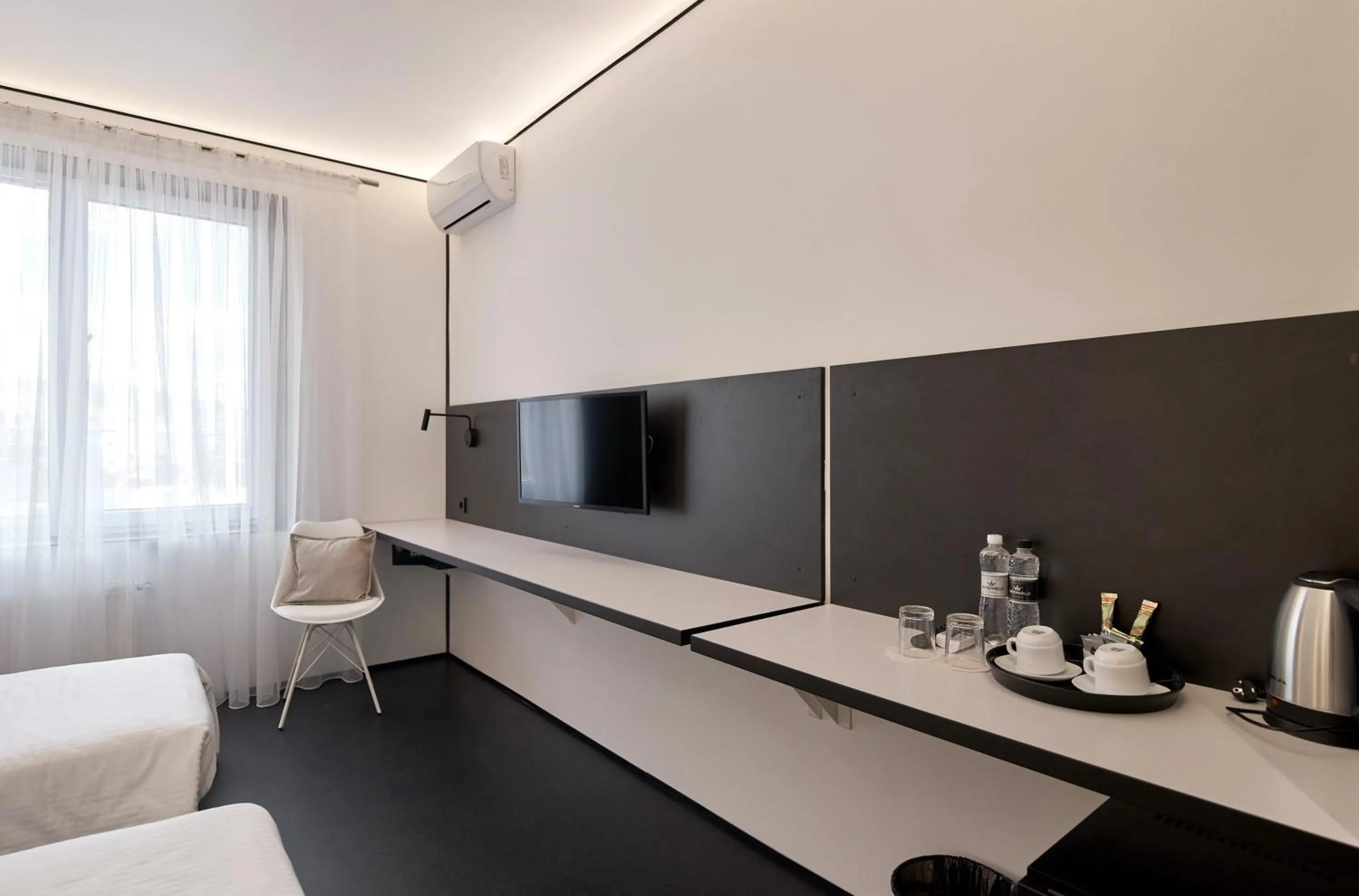 Photo of the whole room in Atmosfera Hotel