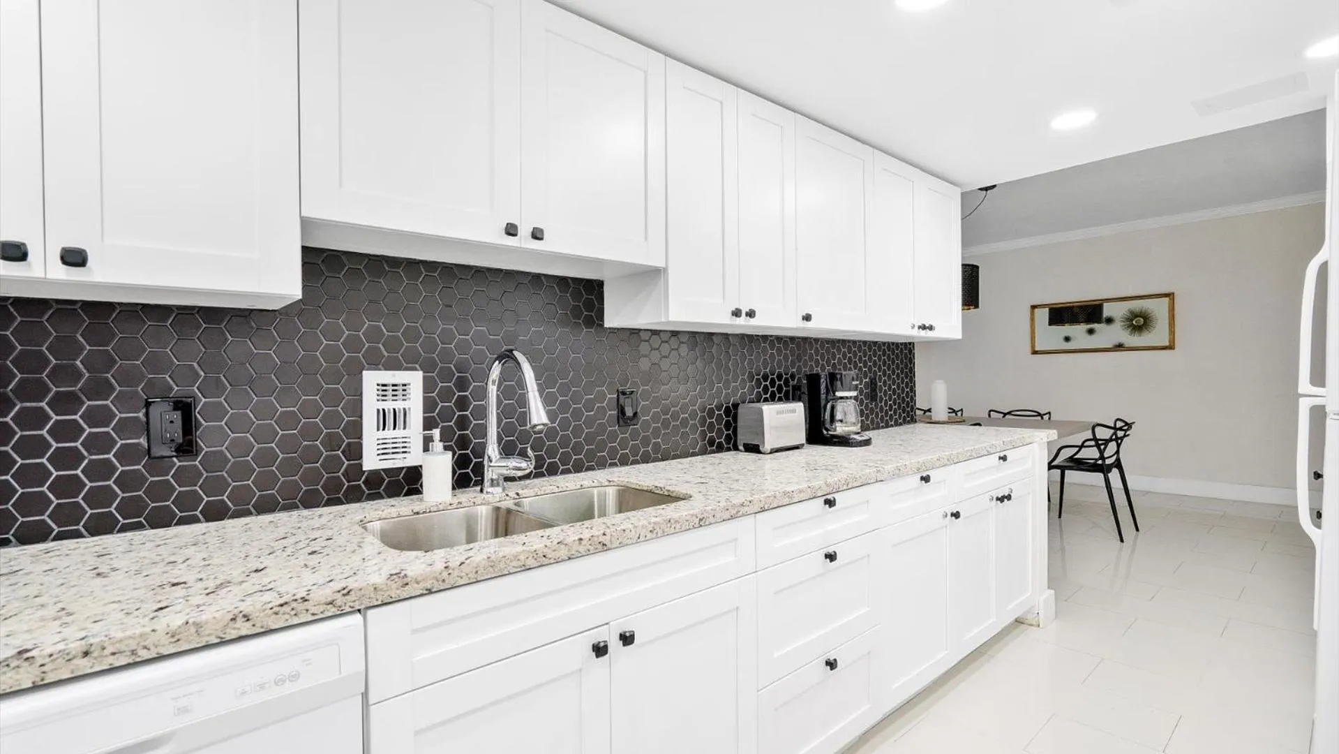 Kitchen or kitchenette in The Tides Ocean Luxury Suites