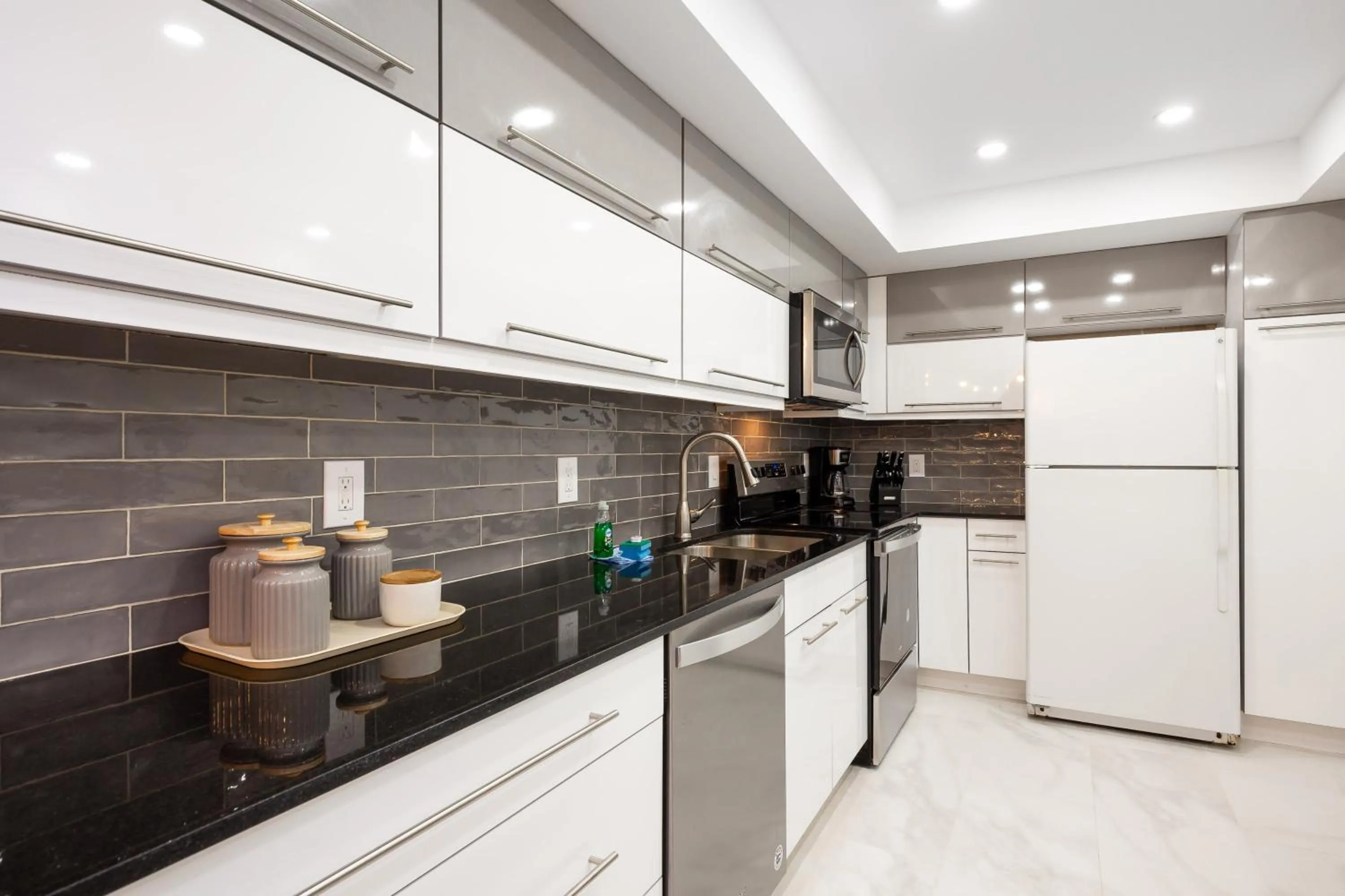 Kitchen or kitchenette in The Tides Ocean Luxury Suites