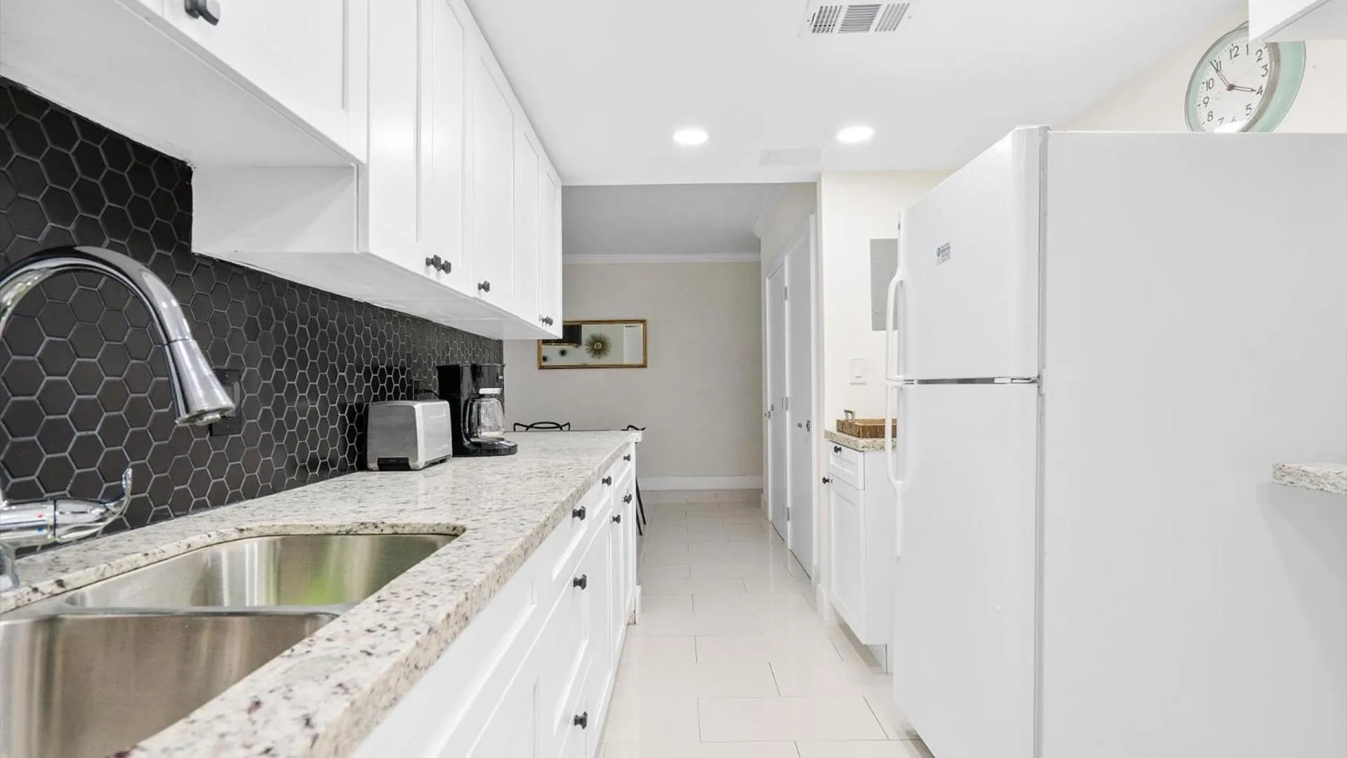 Kitchen or kitchenette in The Tides Ocean Luxury Suites