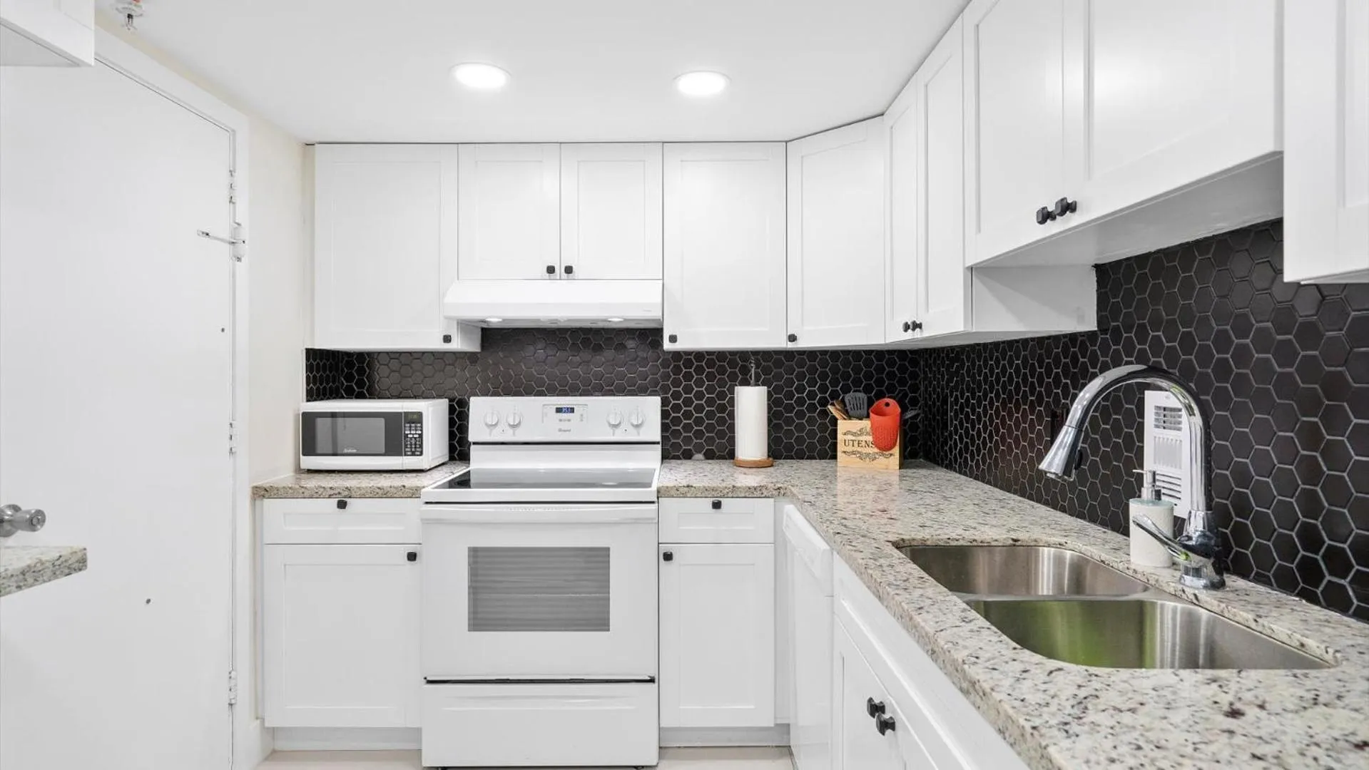 Kitchen or kitchenette in The Tides Ocean Luxury Suites